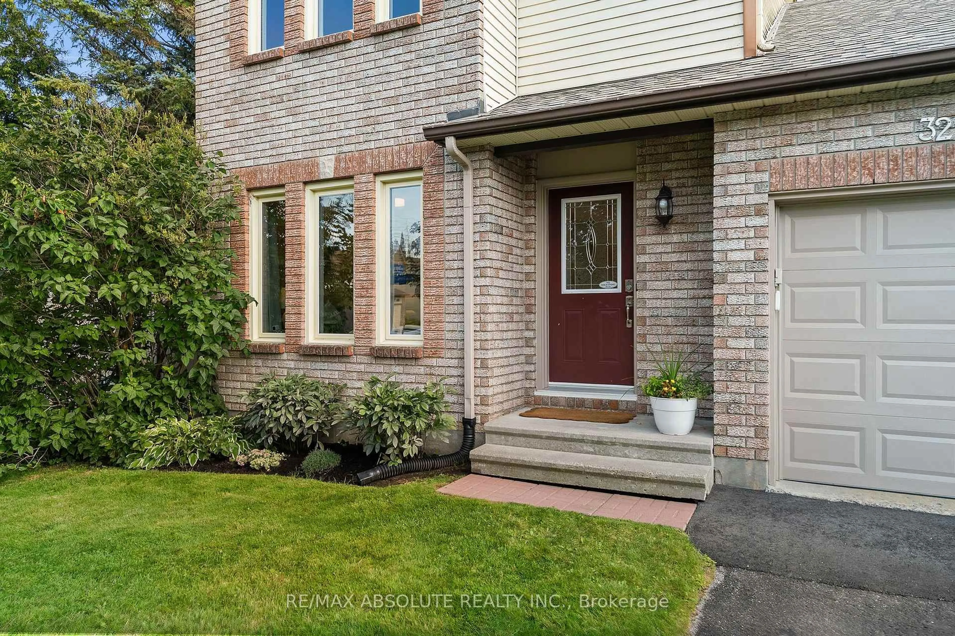 Home with brick exterior material, street for 32 Greer St, Ottawa Ontario K2S 1H7