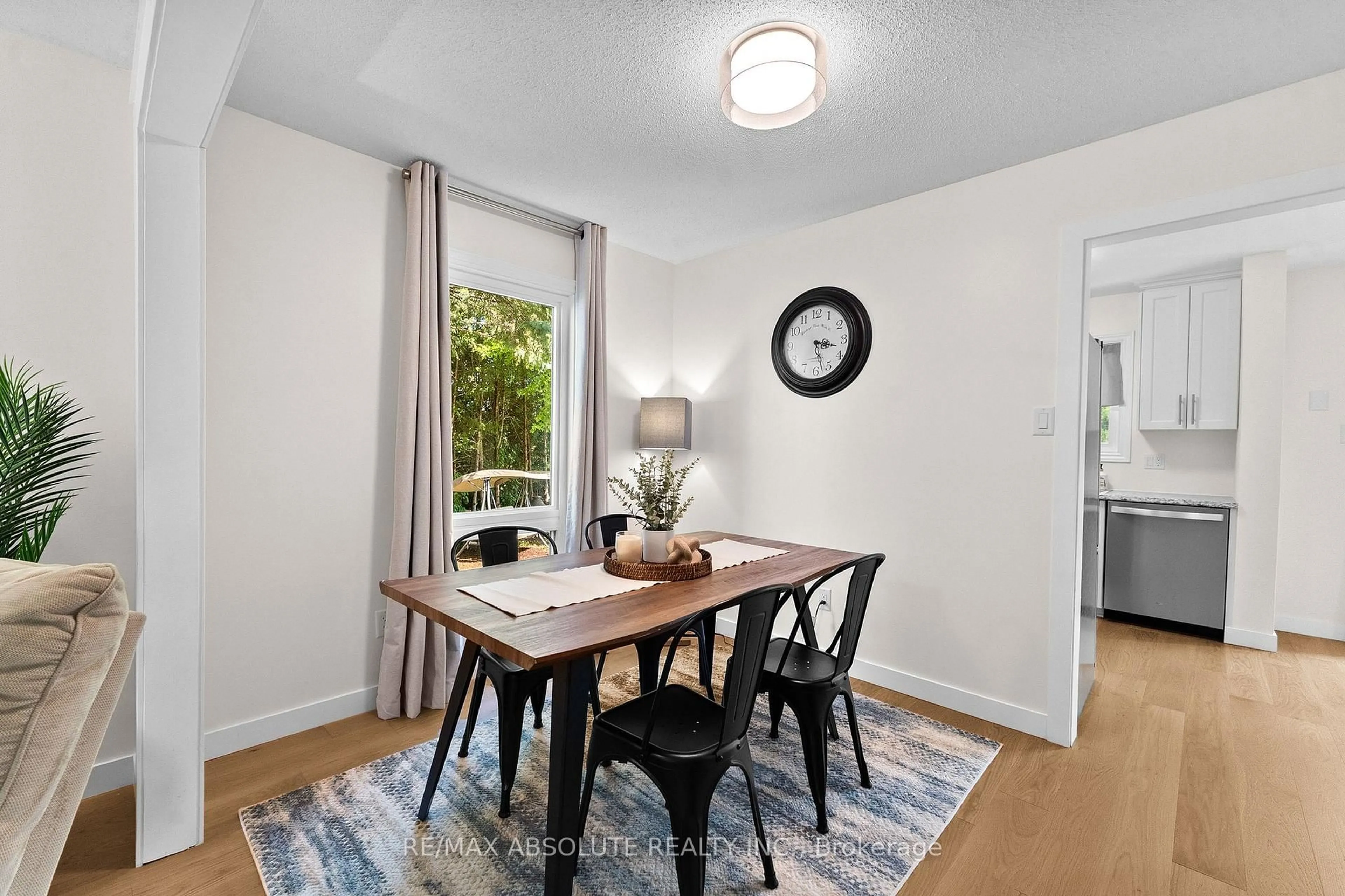Dining room, wood/laminate floor for 32 Greer St, Ottawa Ontario K2S 1H7