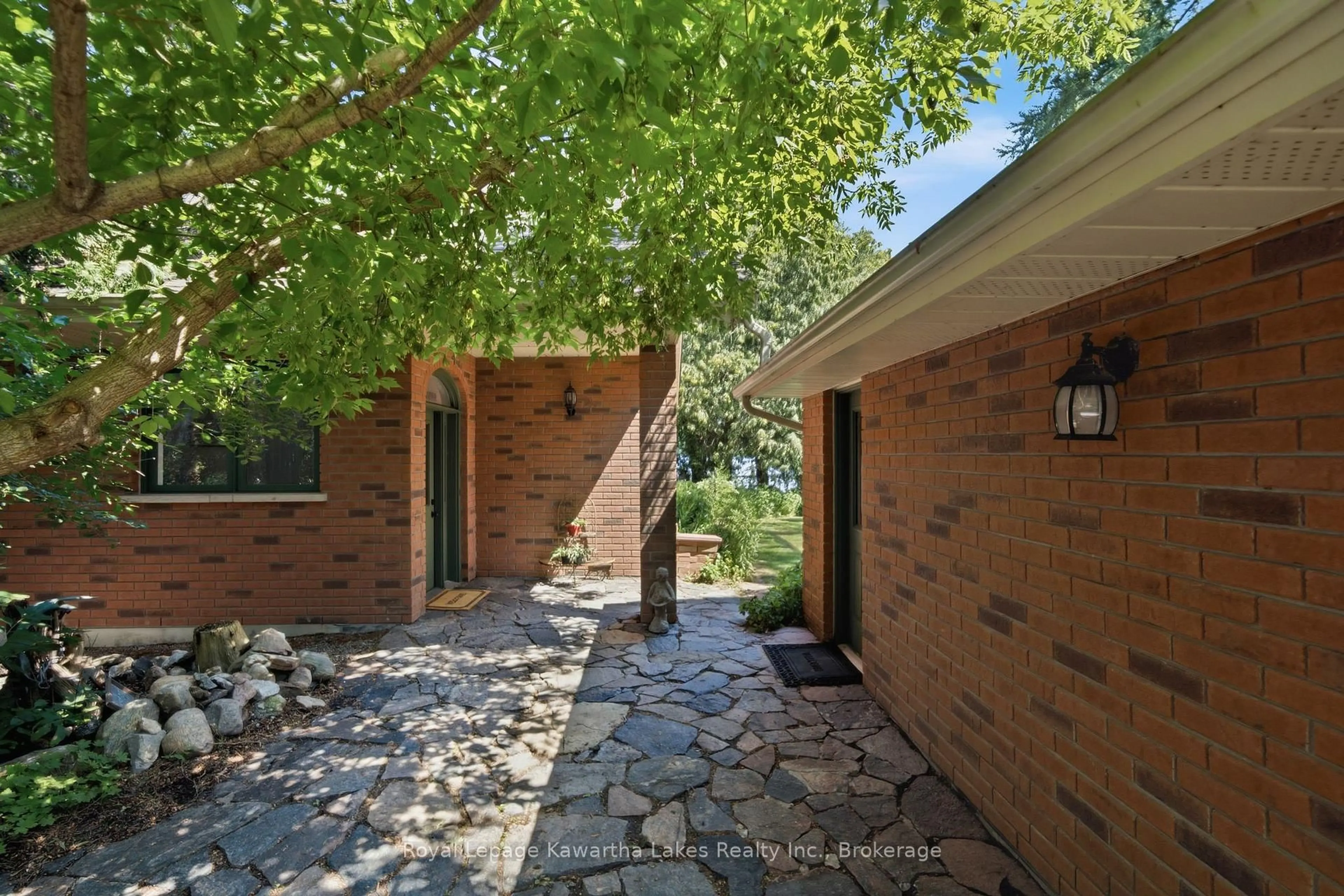 Home with brick exterior material, unknown for 100 Pinewood Blvd, Kawartha Lakes Ontario K0M 2B0