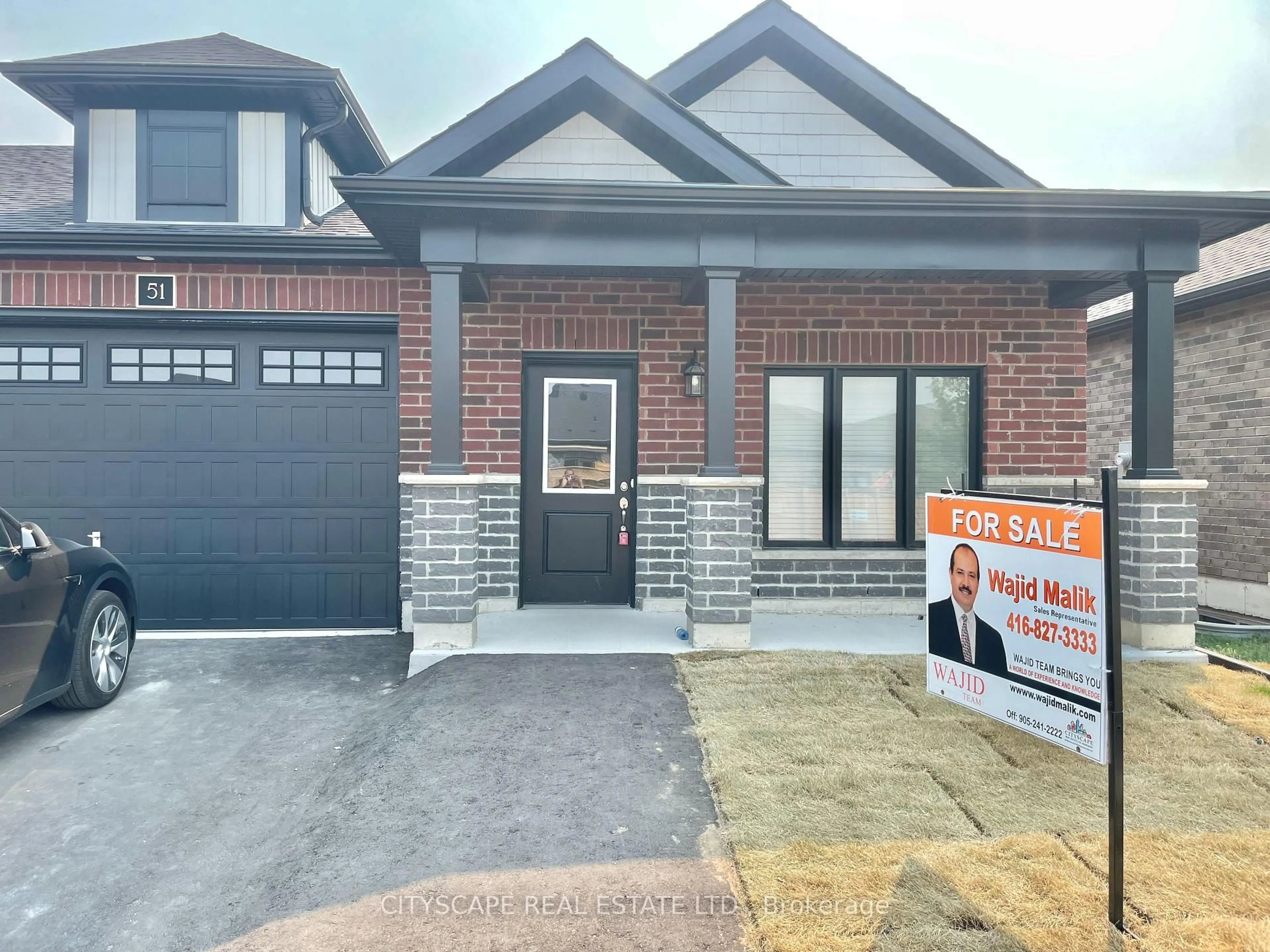 Home with brick exterior material, street for 51 Waterthrush Lane, Norfolk Ontario N3Y 0E9