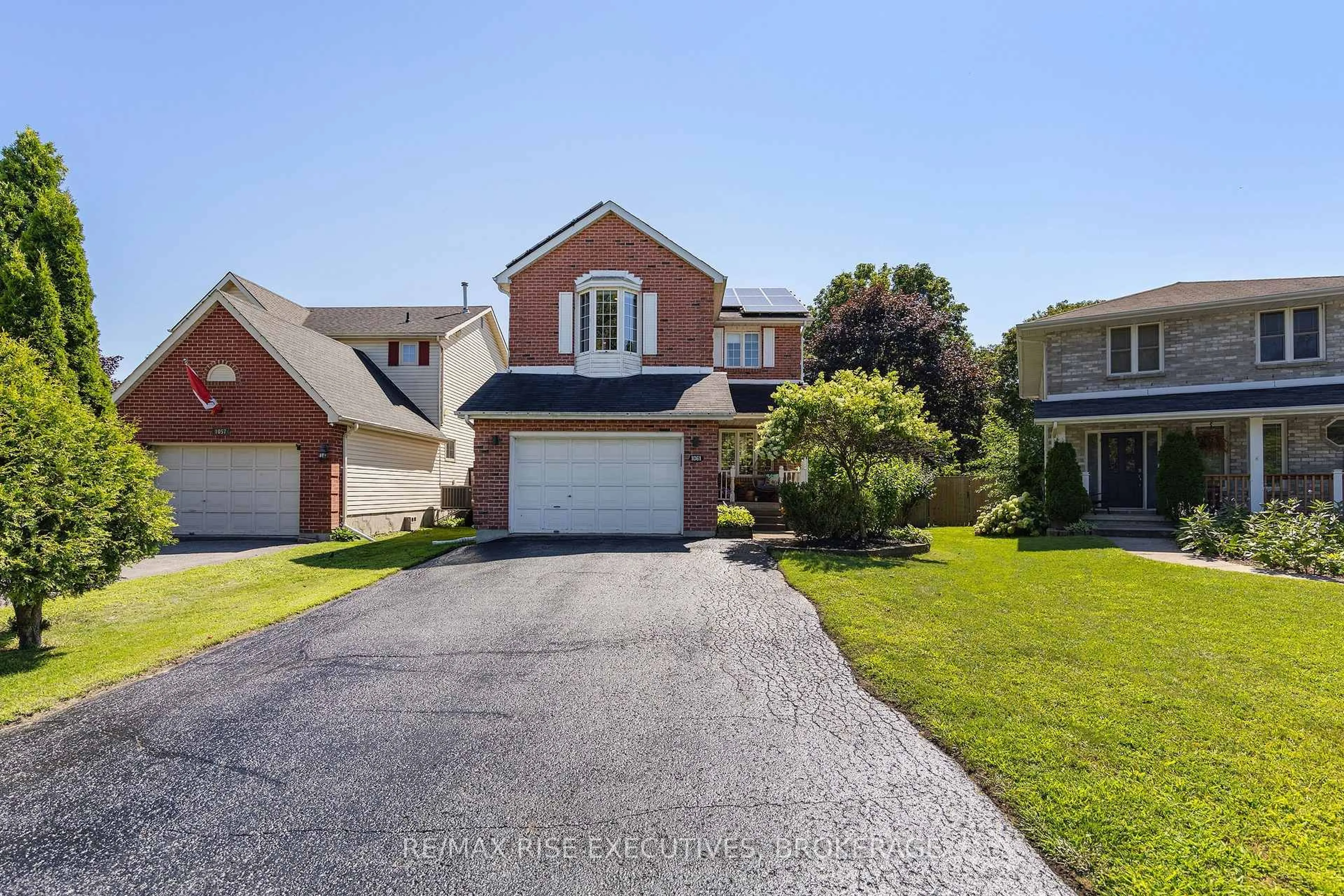 A pic from outside/outdoor area/front of a property/back of a property/a pic from drone, street for 1061 Lombardy St, Kingston Ontario K7M 8M6