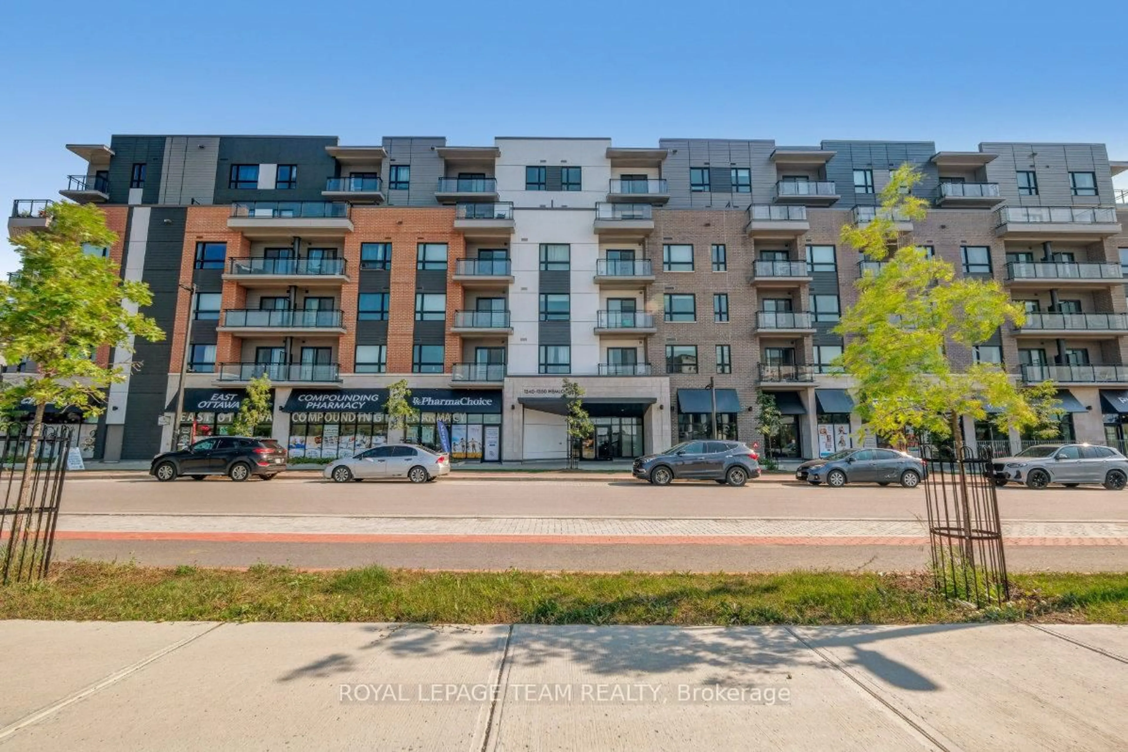 A pic from outside/outdoor area/front of a property/back of a property/a pic from drone, street for 1350 Hemlock Rd #210, Ottawa Ontario K1K 5C2