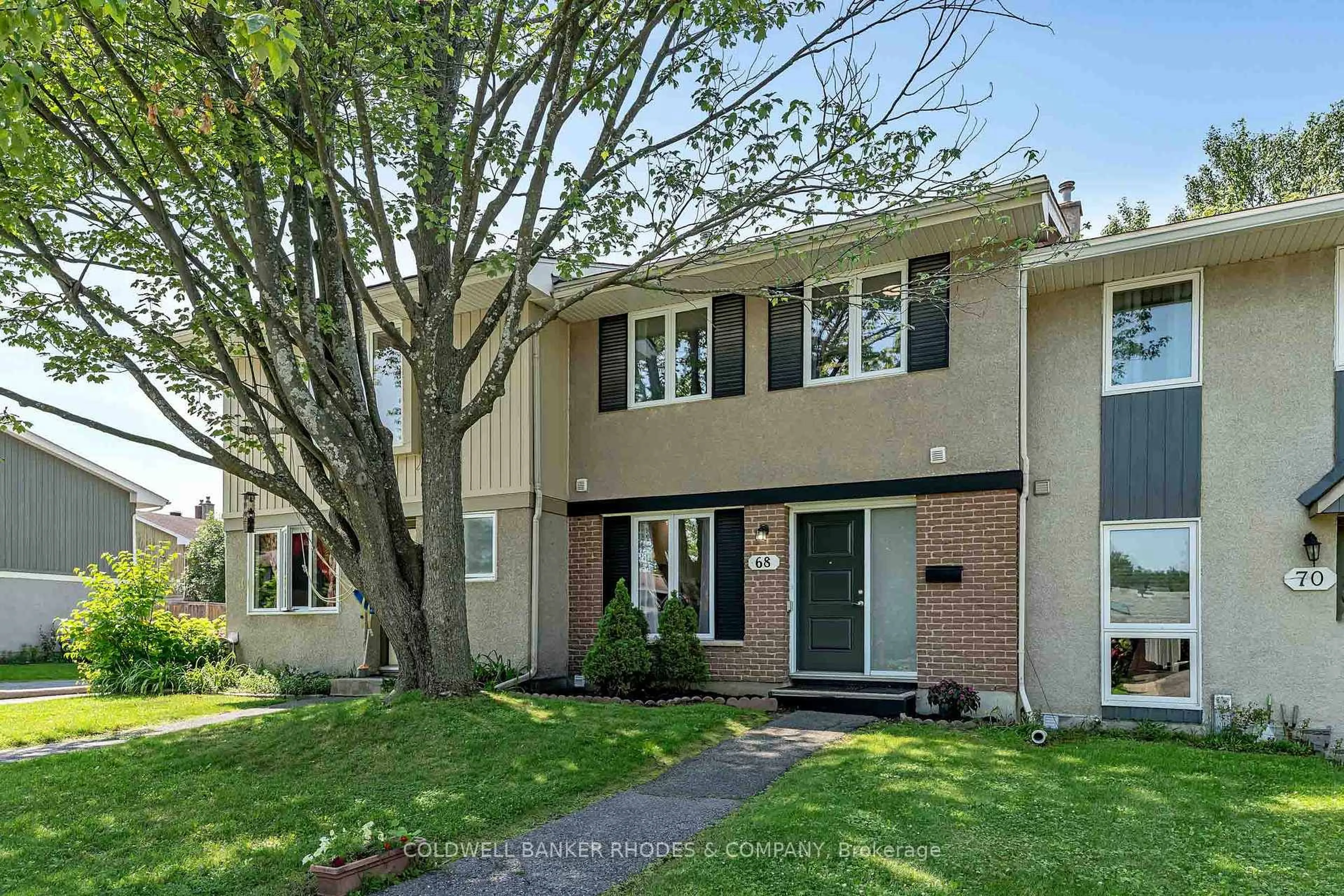 Home with vinyl exterior material, street for 68 Costello Ave, Ottawa Ontario K2H 7C5