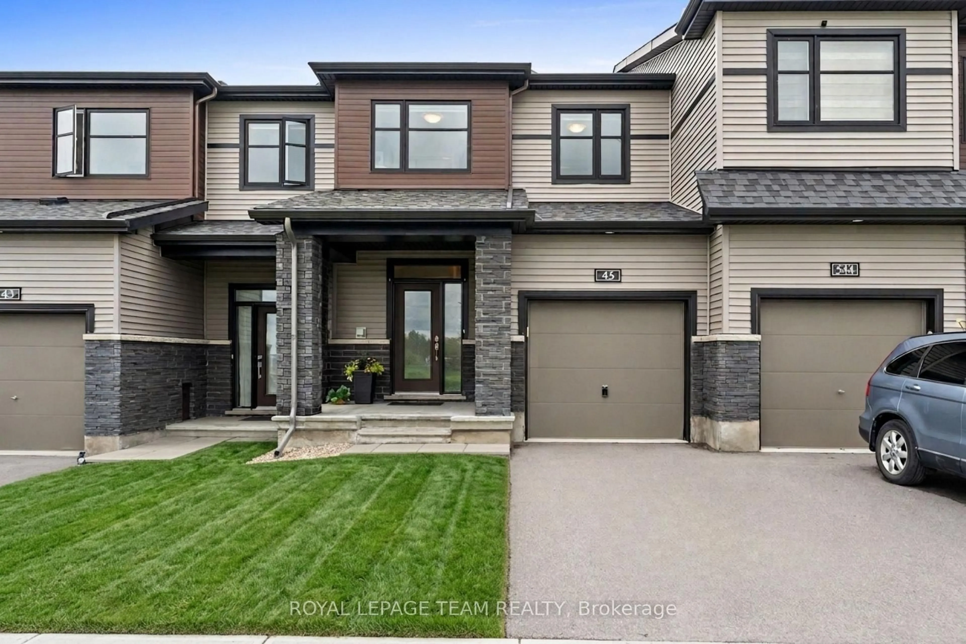 Home with brick exterior material, street for 45 Finglas Crt, Ottawa Ontario K2J 6Y6