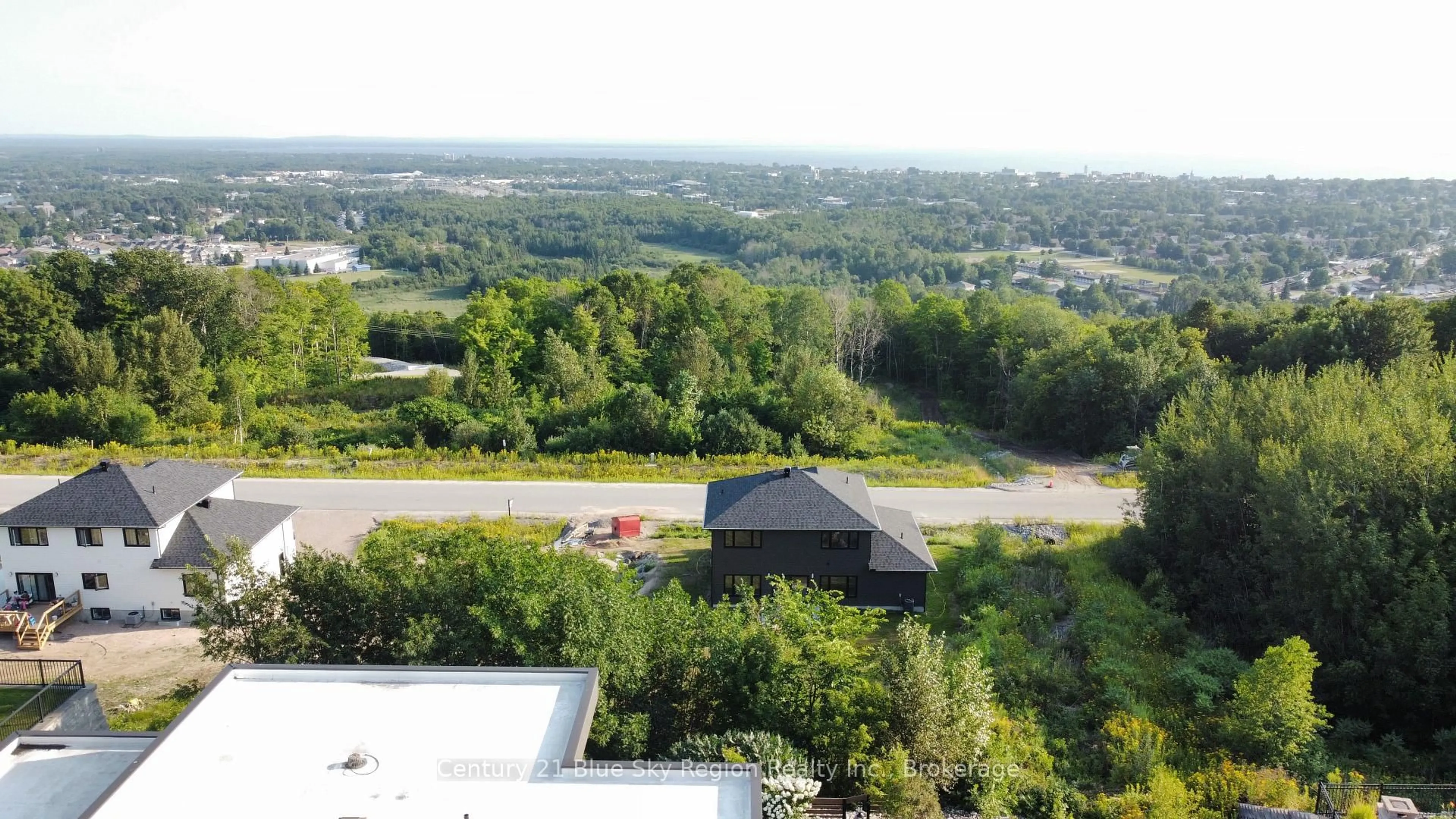 A pic from outside/outdoor area/front of a property/back of a property/a pic from drone, city buildings view from balcony for 79 Kenreta Dr, North Bay Ontario P1C 0A5