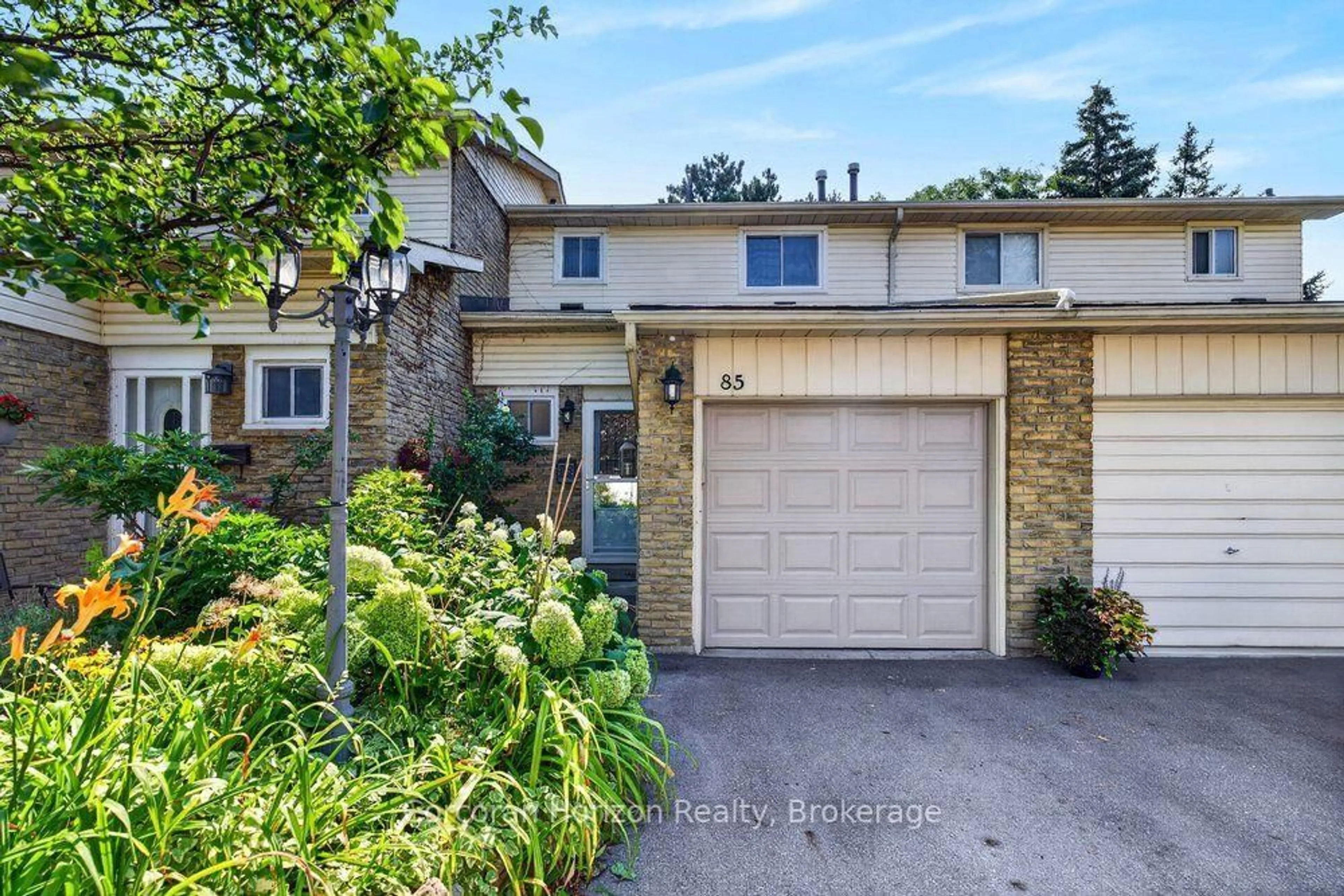 Home with brick exterior material, street for 100 Quigley Rd #85, Hamilton Ontario L8K 6J1