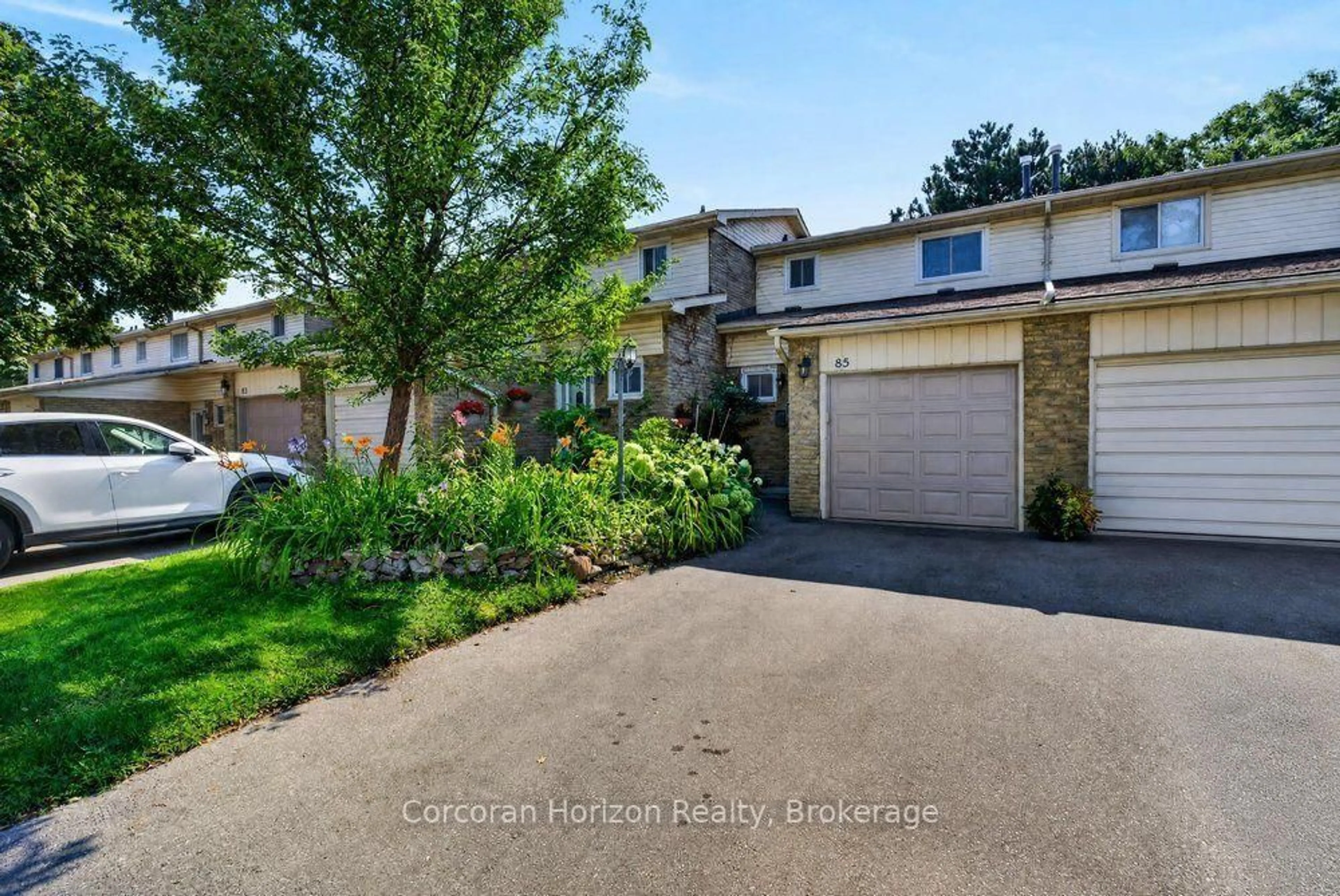A pic from outside/outdoor area/front of a property/back of a property/a pic from drone, street for 100 Quigley Rd #85, Hamilton Ontario L8K 6J1