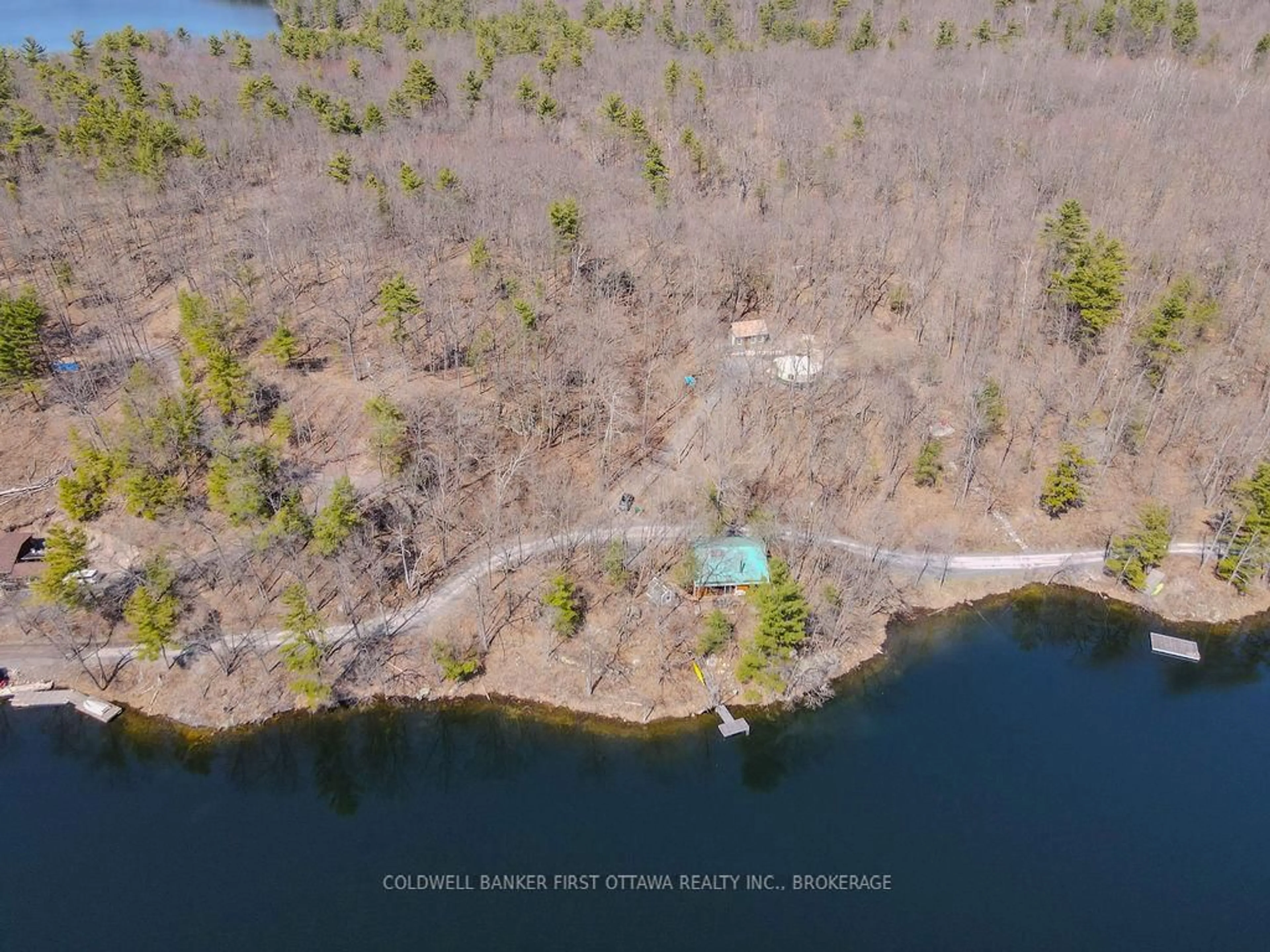 A pic from outside/outdoor area/front of a property/back of a property/a pic from drone, water/lake/river/ocean view for 2238 Little Long Lake Rd, Sydenham Ontario K0H 2T0
