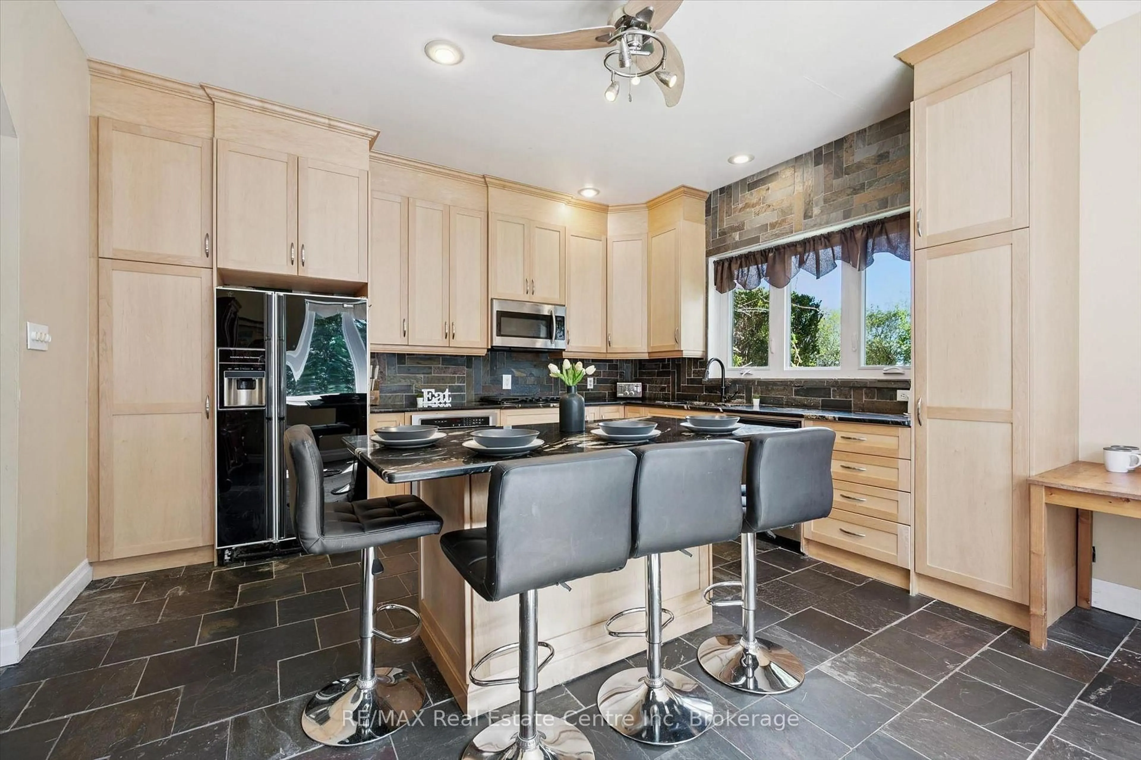 Open concept kitchen, ceramic/tile floor for 6594 Forestell Rd, Puslinch Ontario N1H 6J3