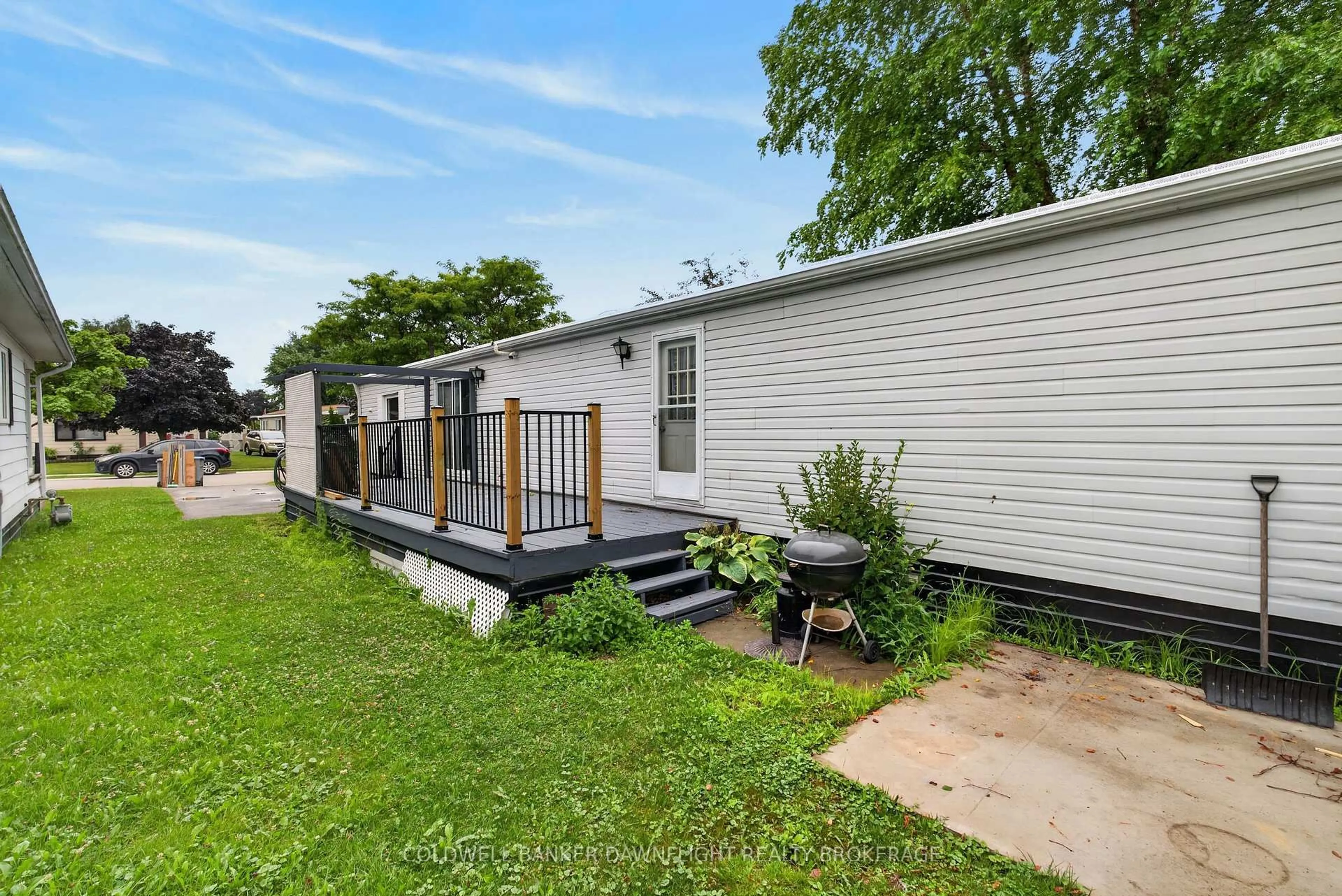 Home with vinyl exterior material, street for 20 Redford Dr, South Huron Ontario N0M 1S3