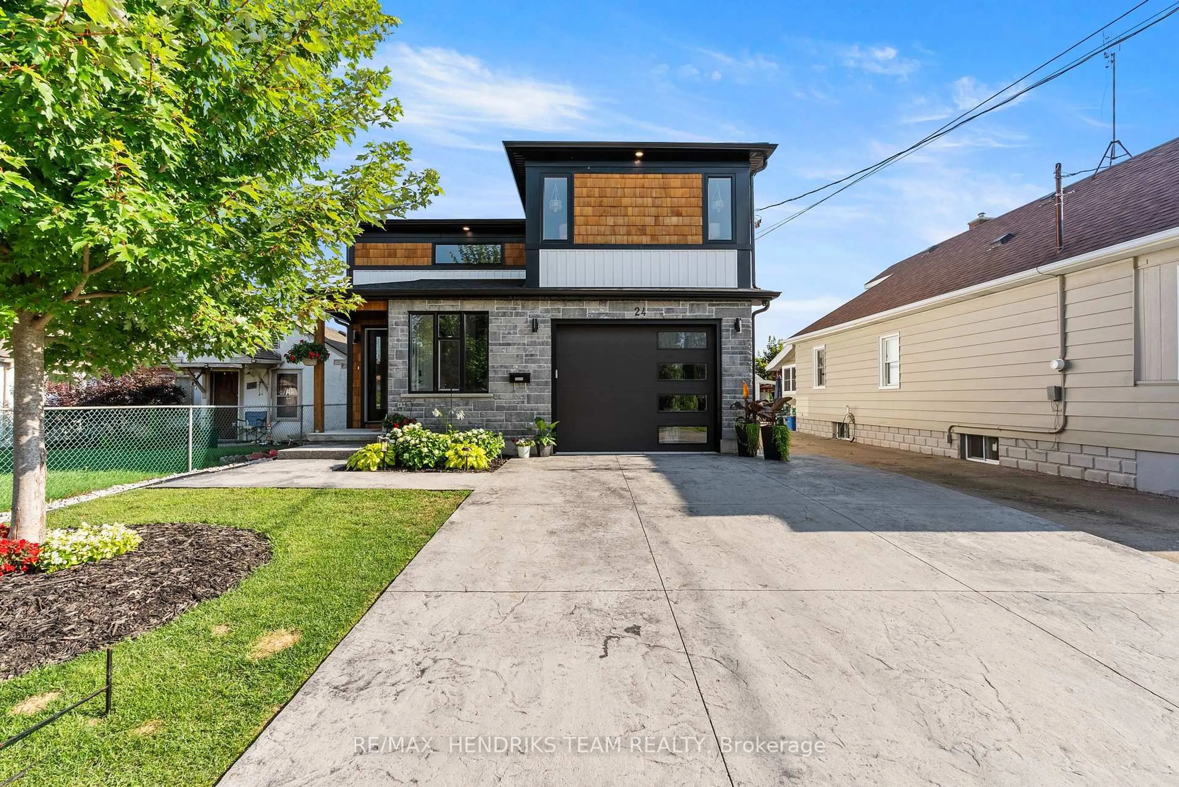 Home with brick exterior material, street for 24 Prospect Ave, St. Catharines Ontario L2M 5K1