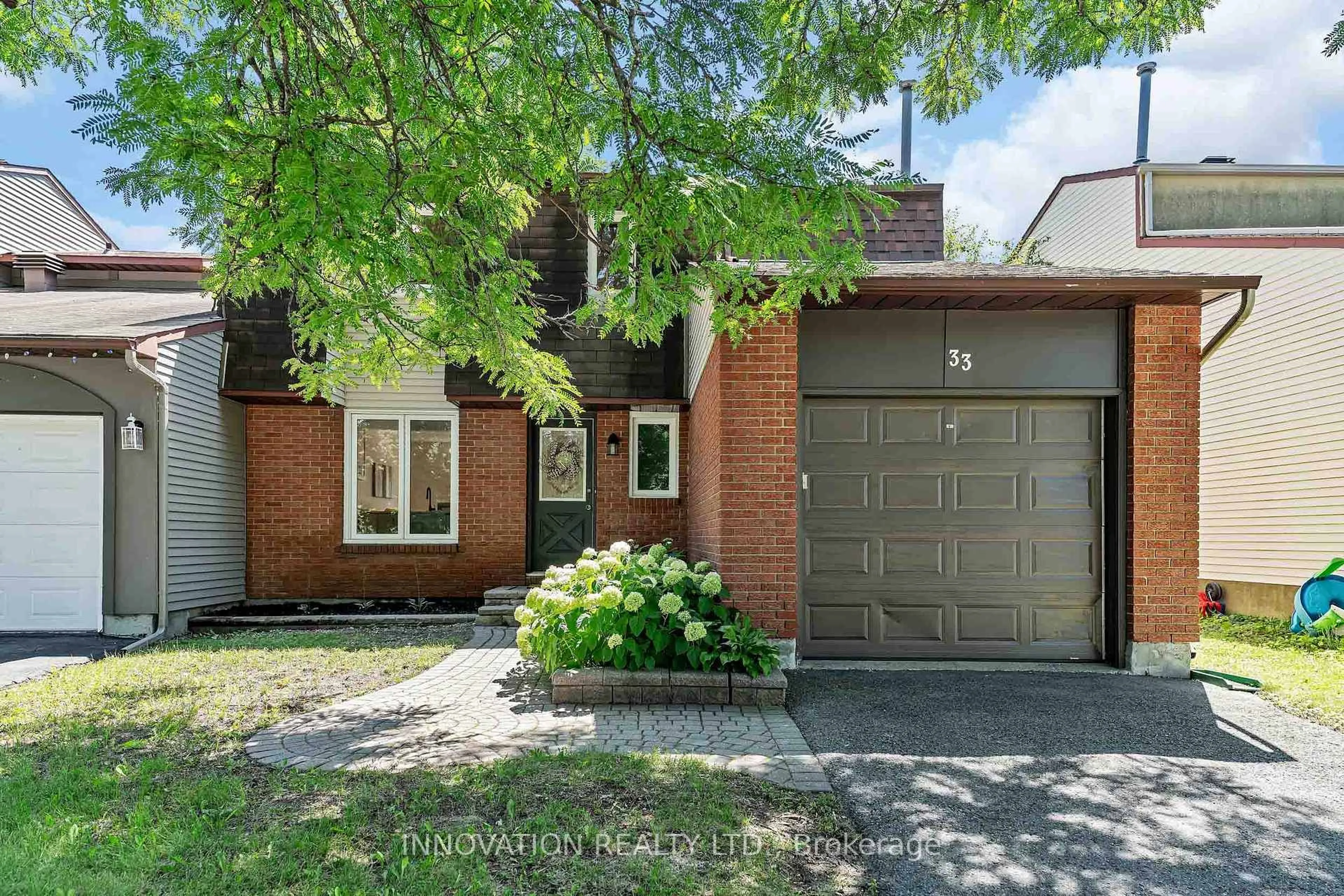 Home with brick exterior material, street for 33 Exeter Dr, Ottawa Ontario K2J 1Z9