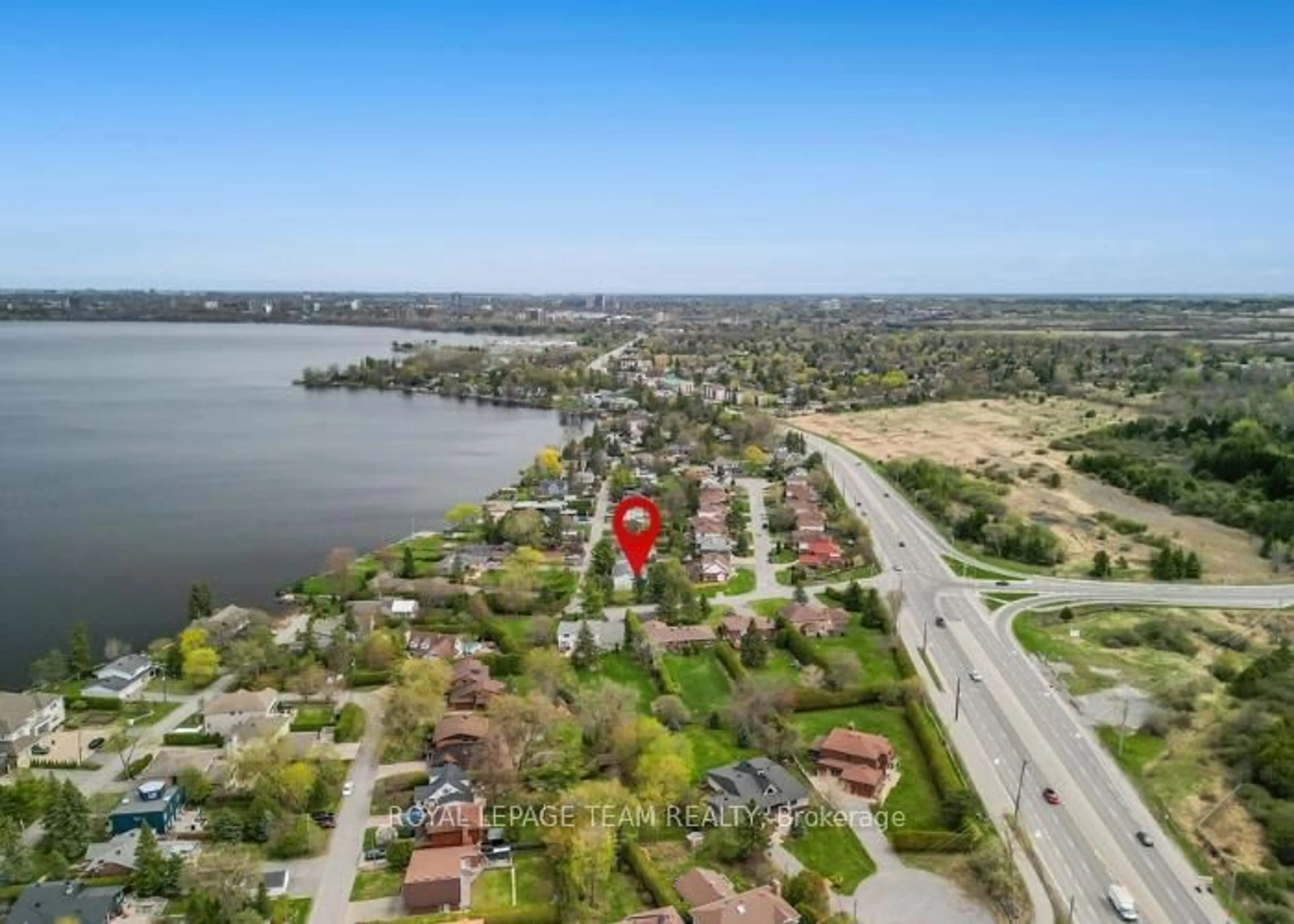A pic from outside/outdoor area/front of a property/back of a property/a pic from drone, water/lake/river/ocean view for 136 James Cummings Ave, Ottawa Ontario K2H 8E1