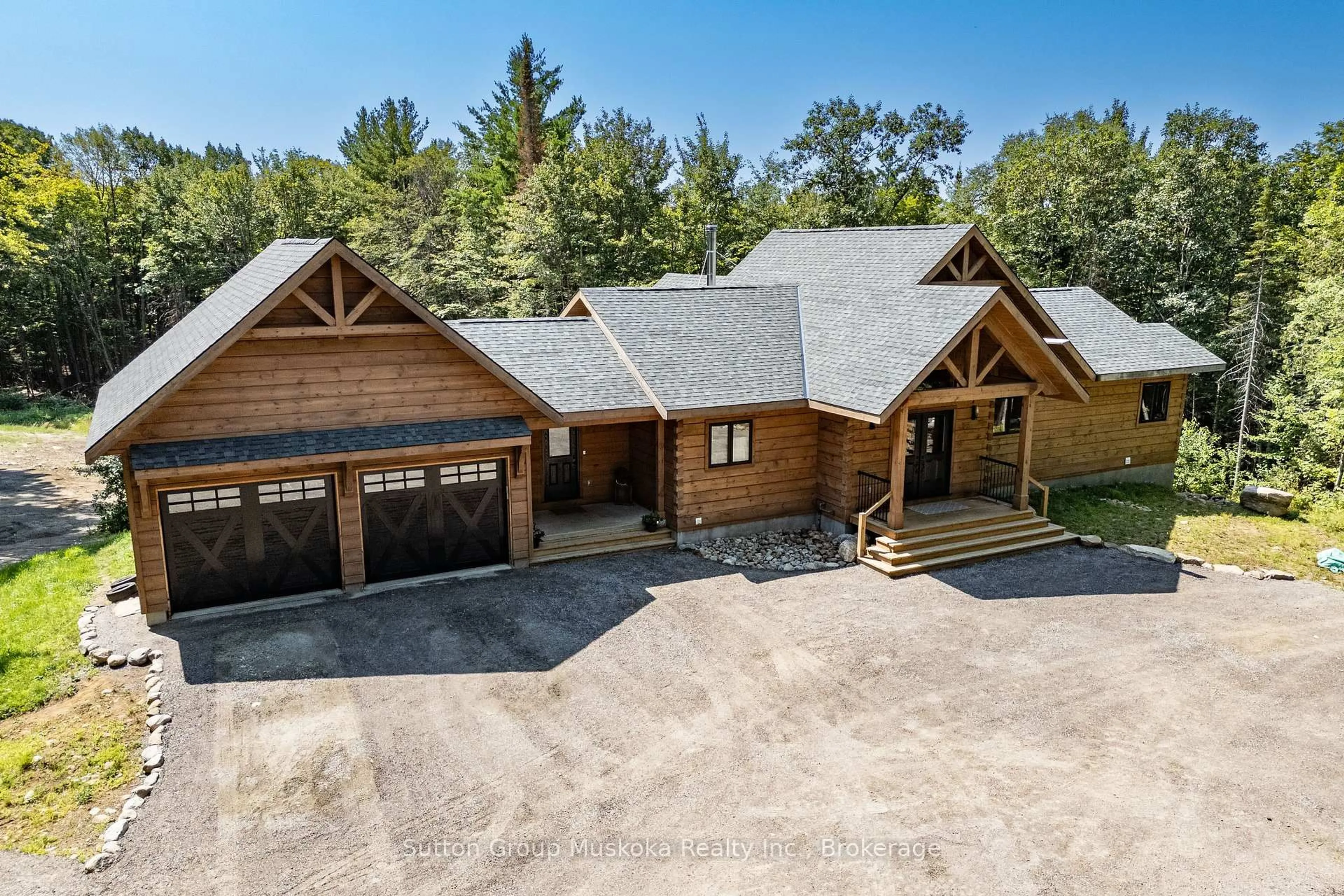 A pic from outside/outdoor area/front of a property/back of a property/a pic from drone, mountain view for 1265 Britannia Rd, Huntsville Ontario P1H 2J3
