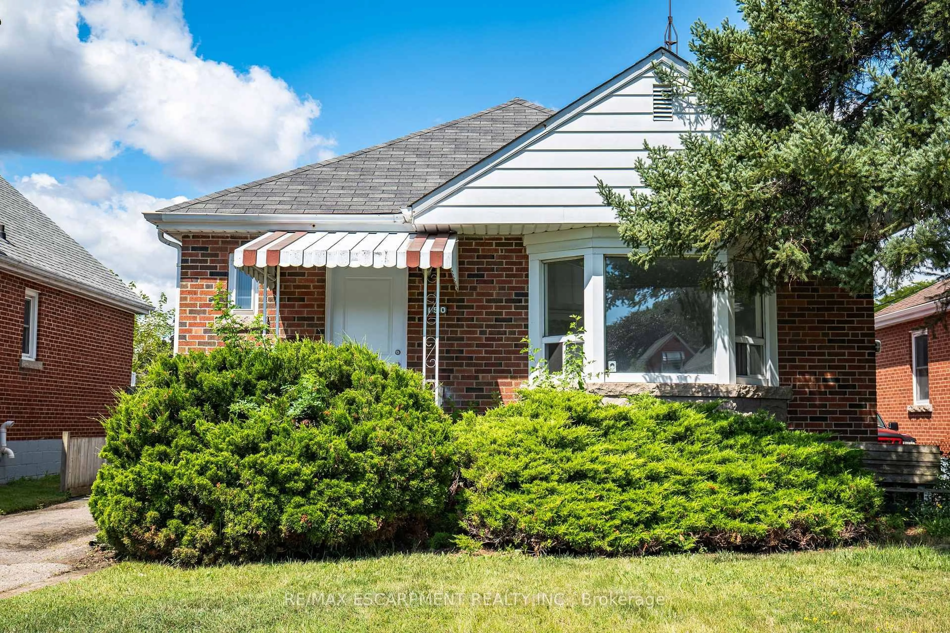 Home with brick exterior material, street for 150 Beland Ave, Hamilton Ontario L8K 3T6