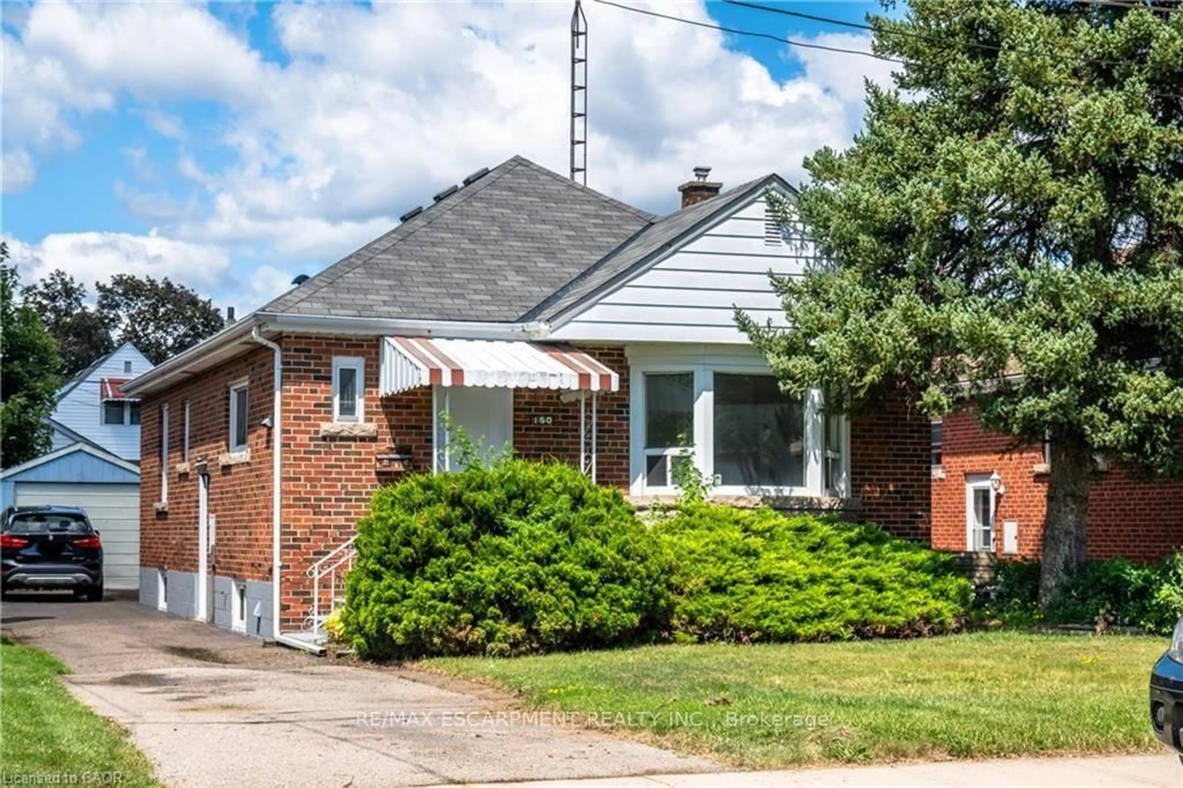 Home with brick exterior material, street for 150 Beland Ave, Hamilton Ontario L8K 3T6