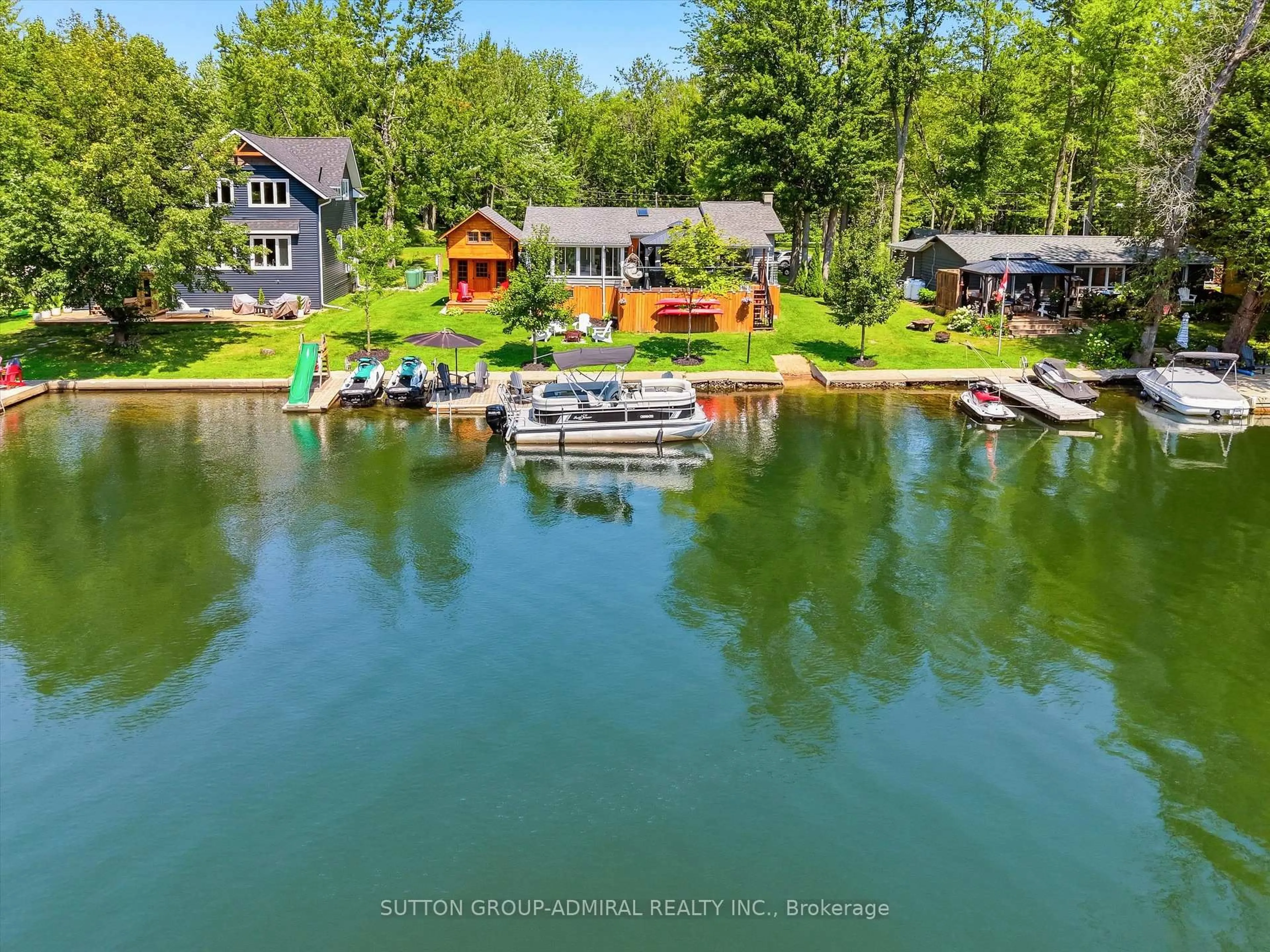 A pic from outside/outdoor area/front of a property/back of a property/a pic from drone, water/lake/river/ocean view for 1004 Bagley Rd, Gravenhurst Ontario P0E 1N0