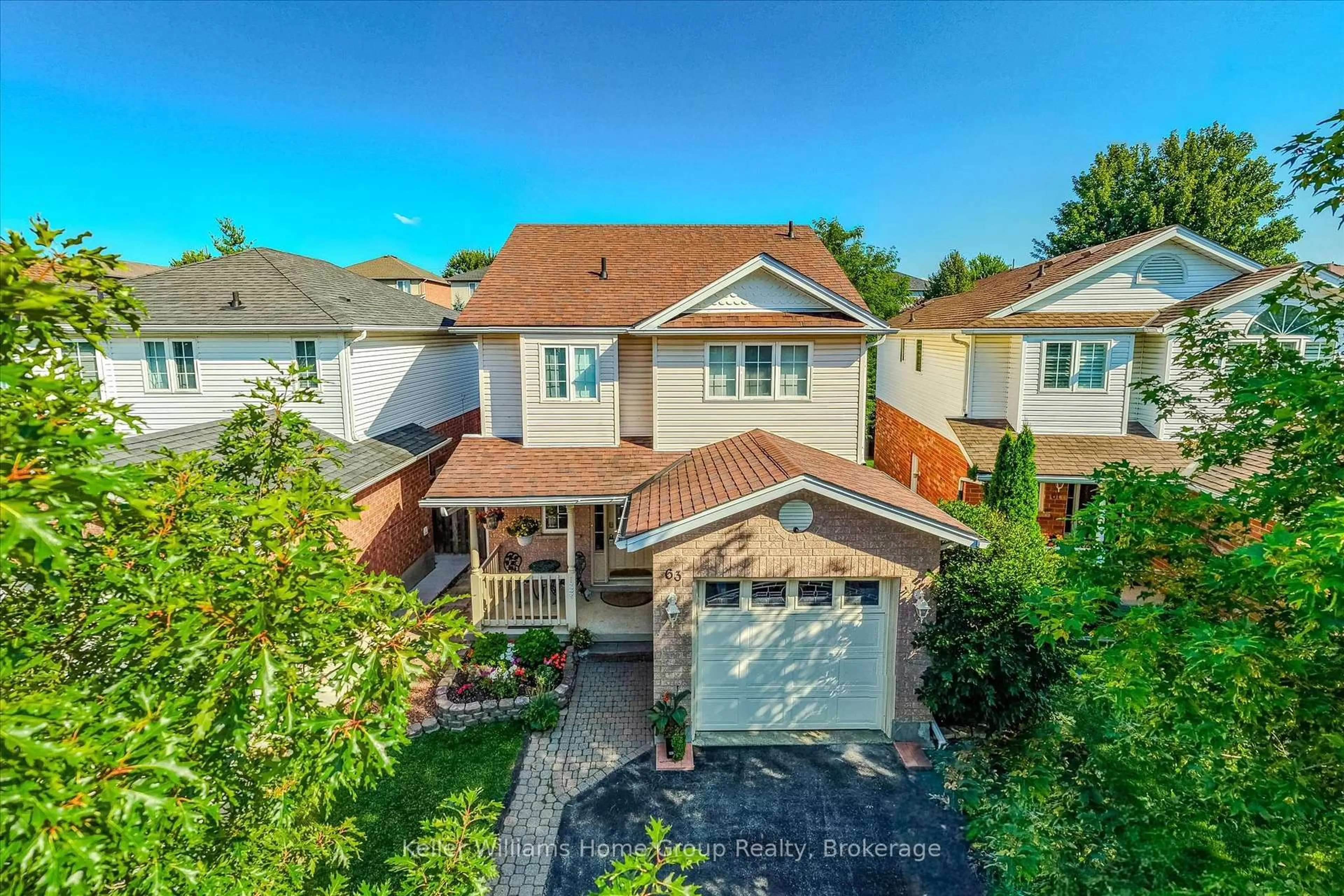 A pic from outside/outdoor area/front of a property/back of a property/a pic from drone, street for 63 Boulder Cres, Guelph Ontario N1G 5A2