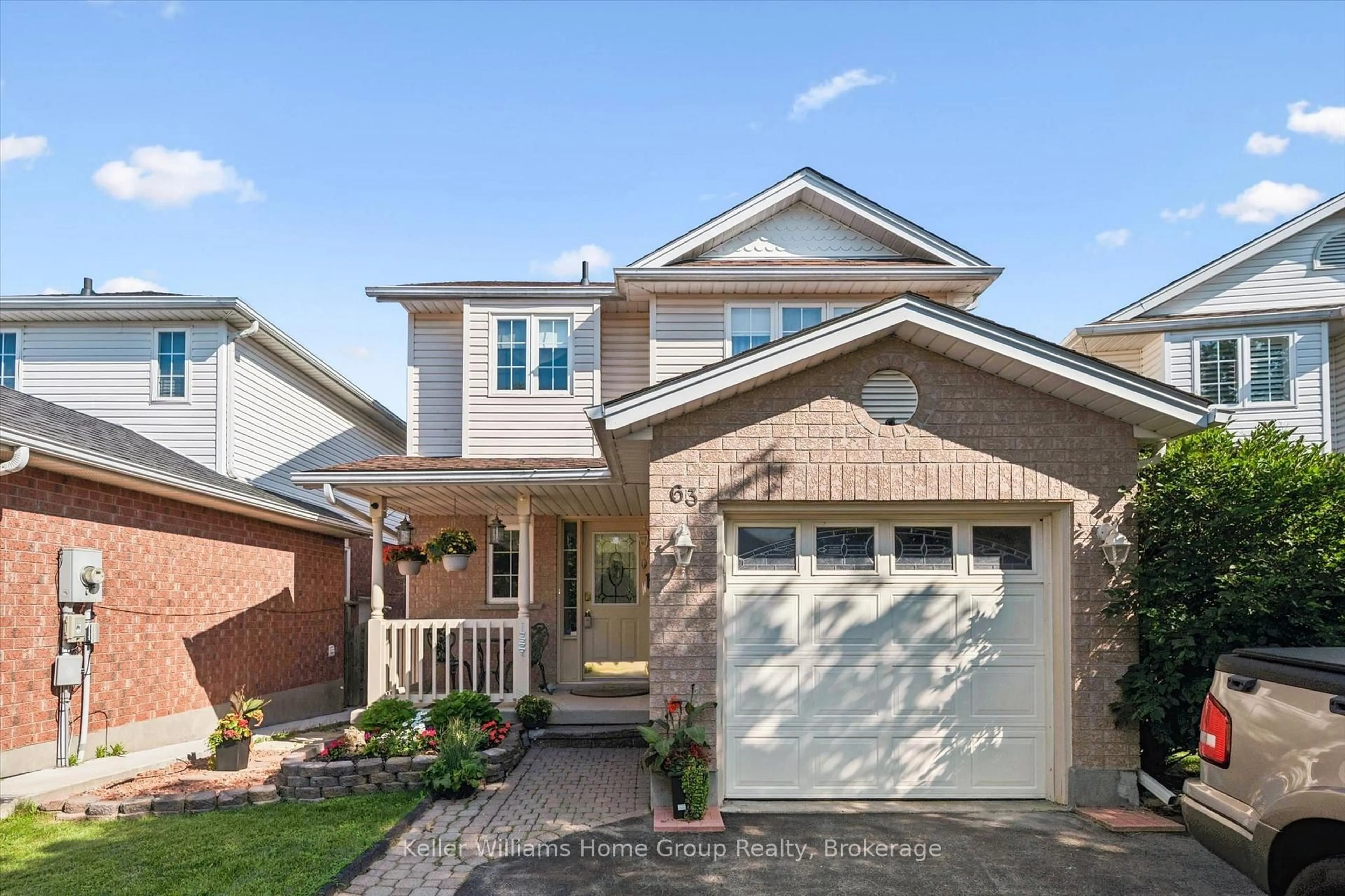 Home with brick exterior material, street for 63 Boulder Cres, Guelph Ontario N1G 5A2