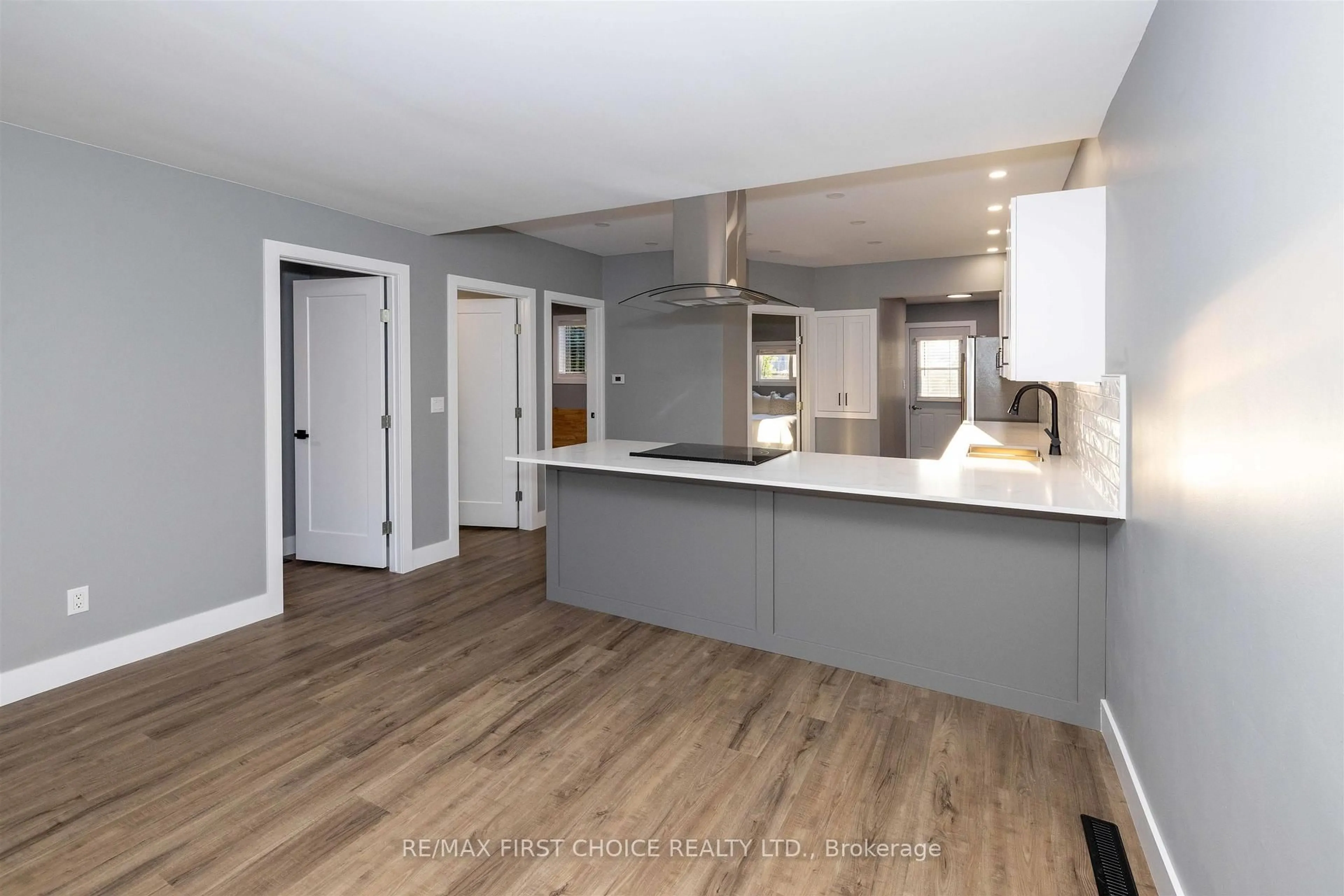 Open concept kitchen, wood/laminate floor for 120 Rockwood Ave, Thunder Bay Ontario P7B 4K2
