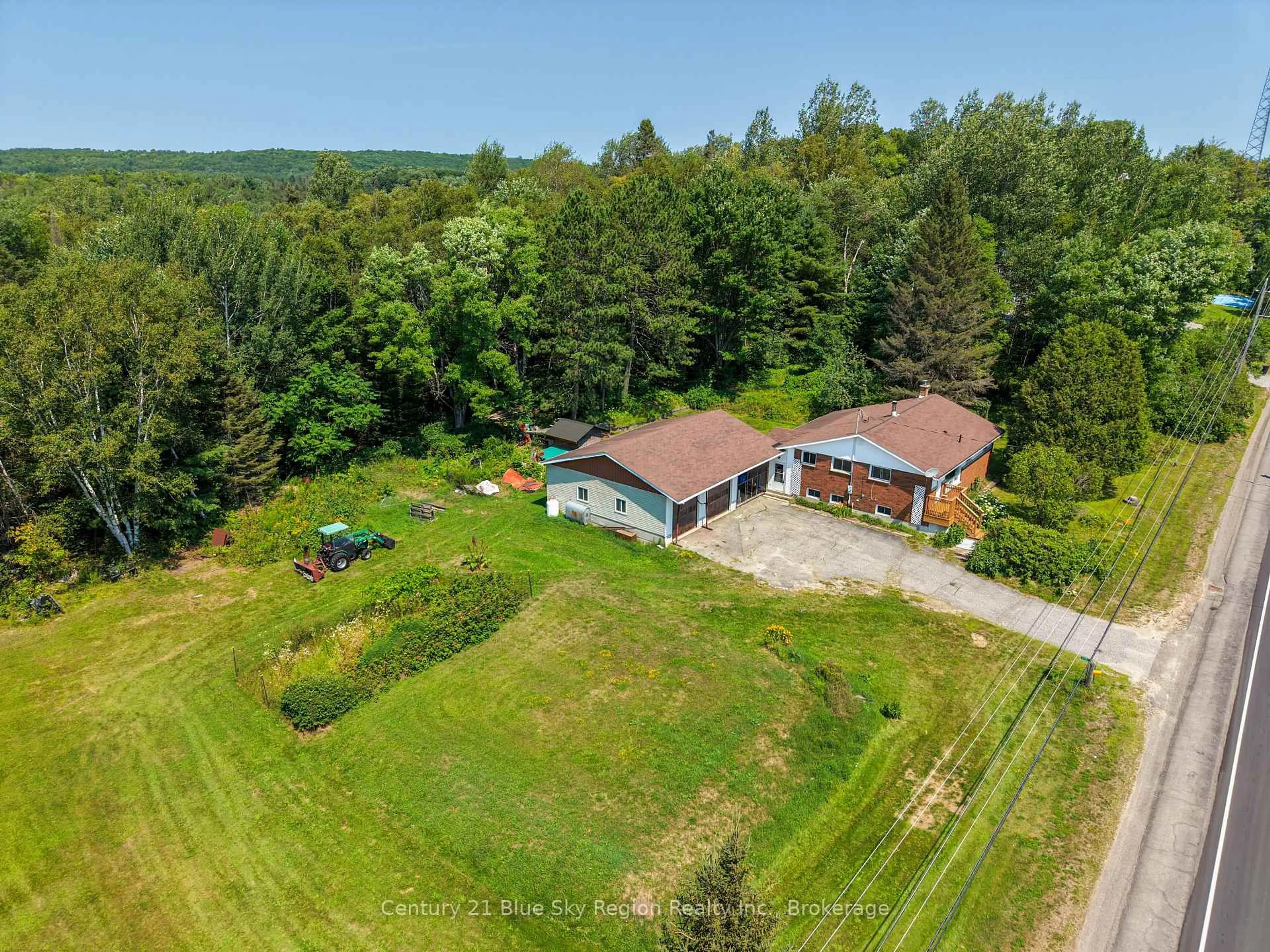 A pic from outside/outdoor area/front of a property/back of a property/a pic from drone, unknown for 1351 Village Rd, East Ferris Ontario P0H 1B0