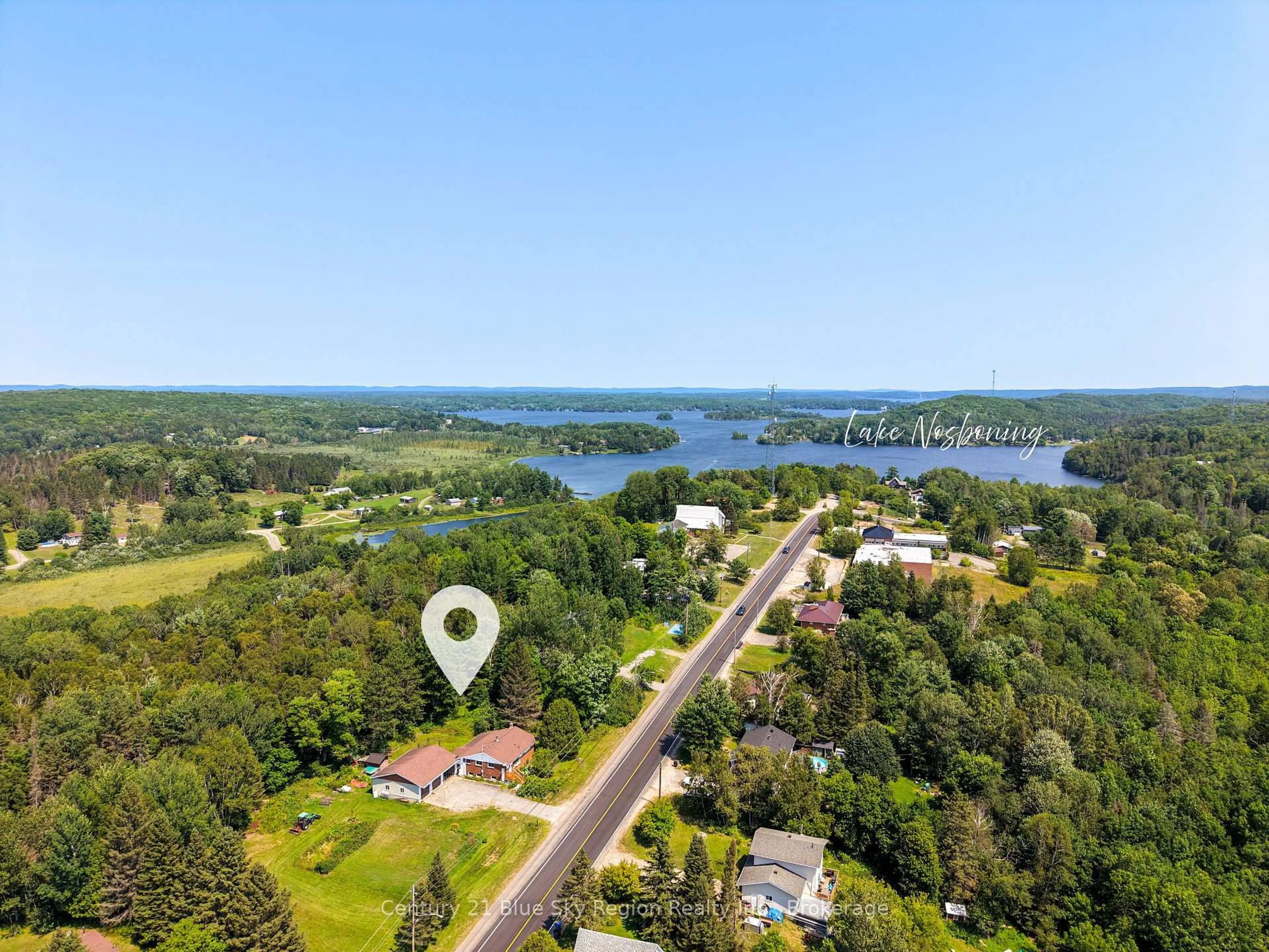 A pic from outside/outdoor area/front of a property/back of a property/a pic from drone, water/lake/river/ocean view for 1351 Village Rd, East Ferris Ontario P0H 1B0