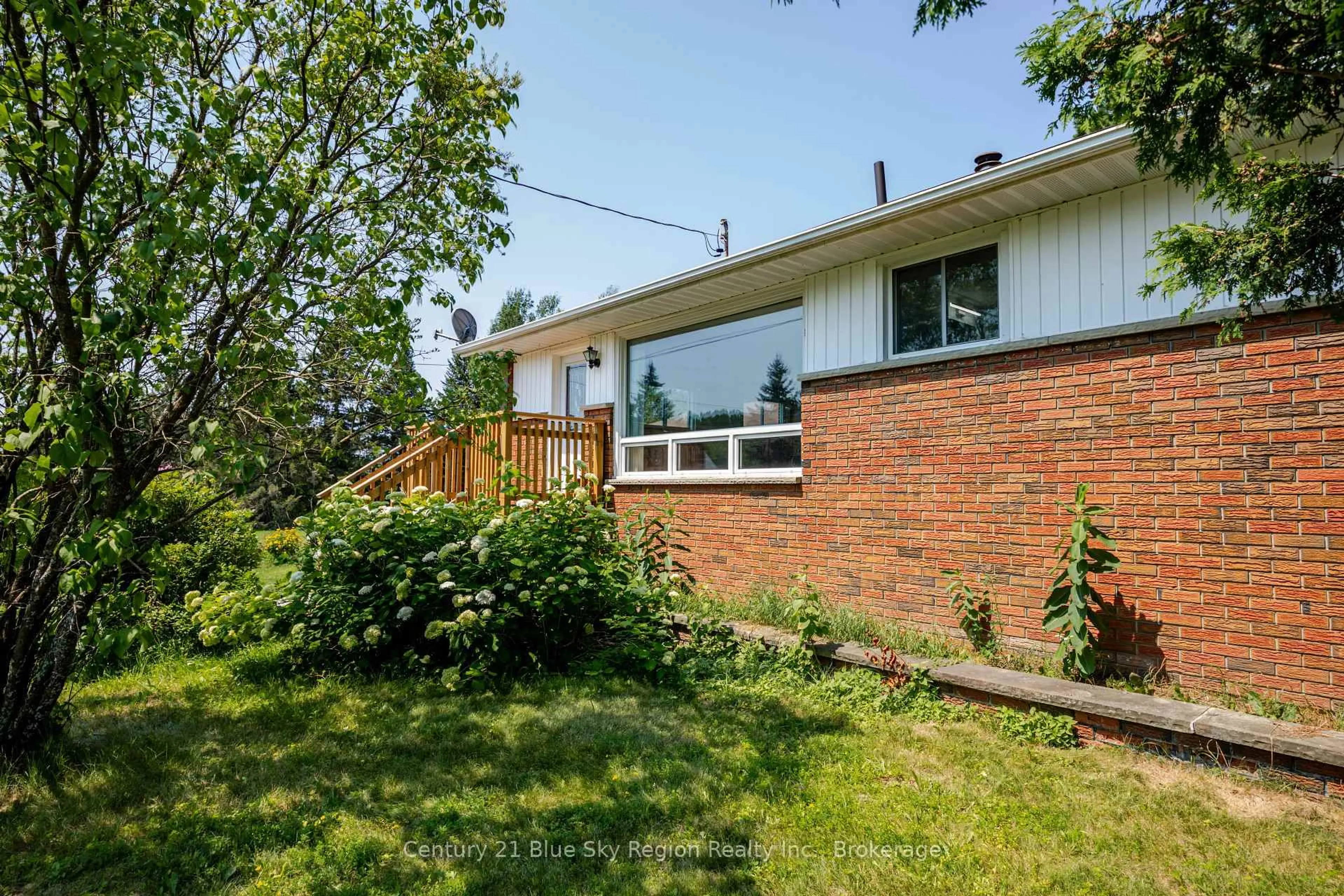 A pic from outside/outdoor area/front of a property/back of a property/a pic from drone, unknown for 1351 Village Rd, East Ferris Ontario P0H 1B0