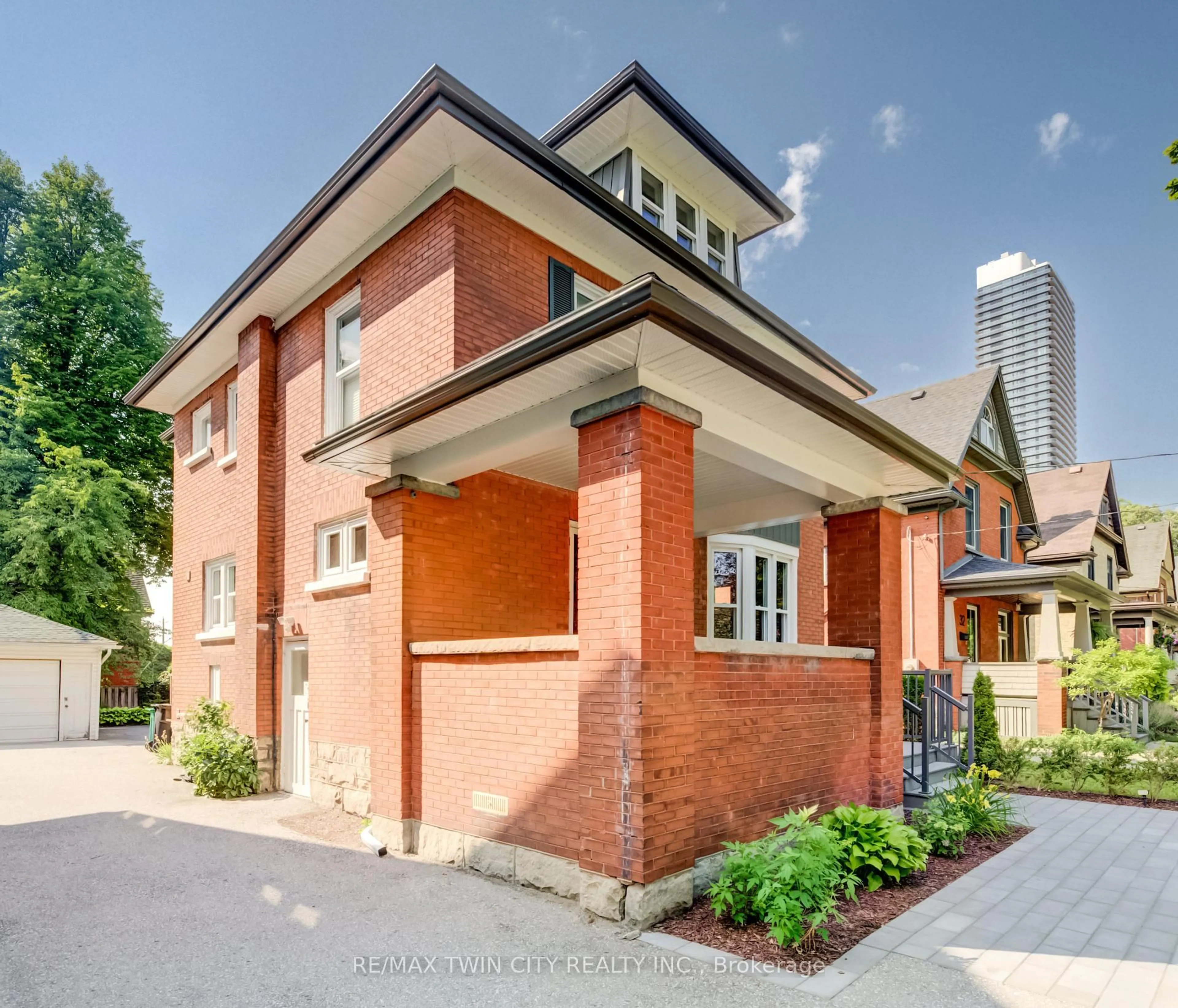 Home with brick exterior material, street for 36 Heins Ave, Kitchener Ontario N2G 1Z8
