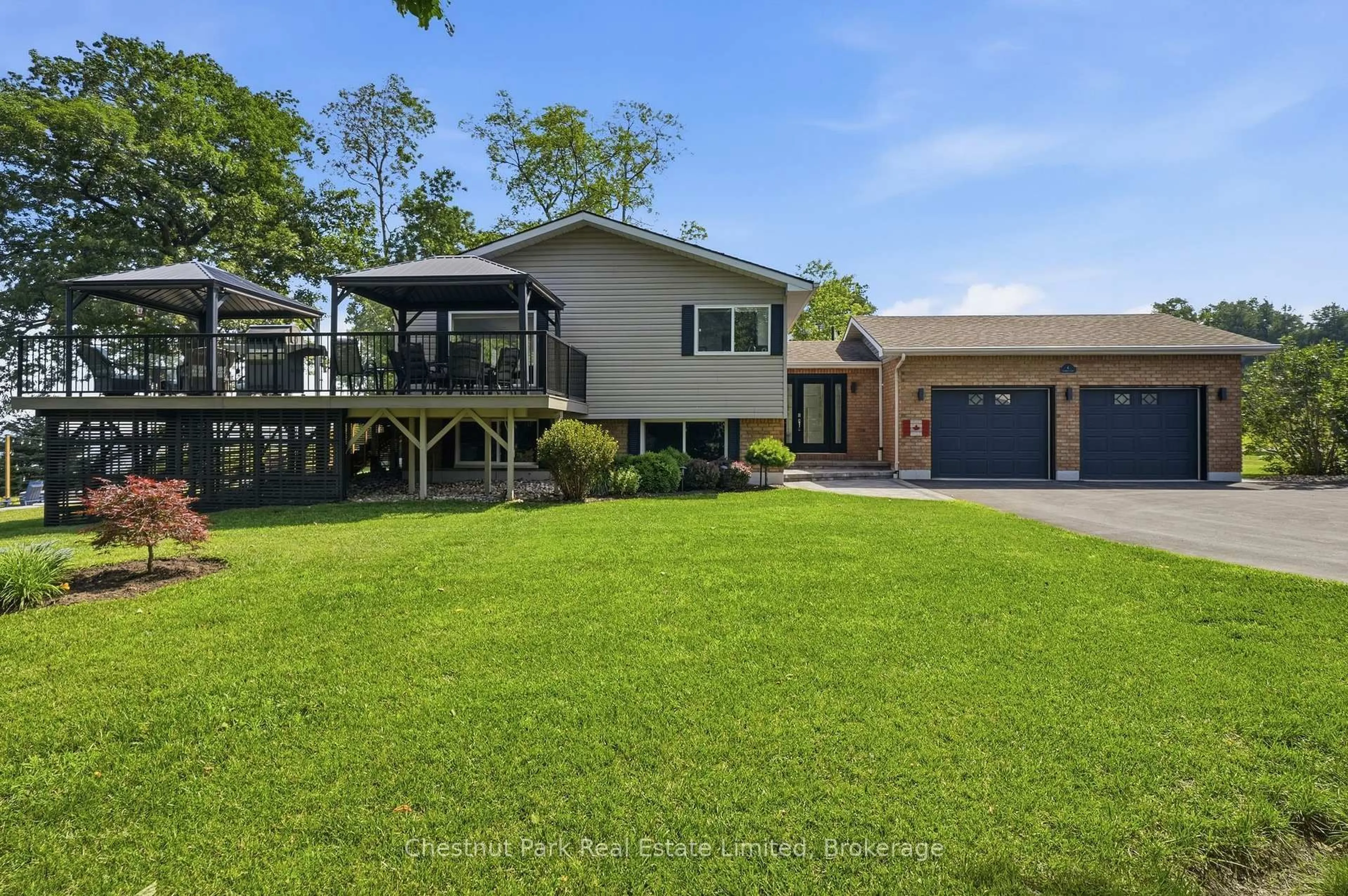 A pic from outside/outdoor area/front of a property/back of a property/a pic from drone, water/lake/river/ocean view for 4 Trumble Lane, Prince Edward County Ontario K0K 2T0
