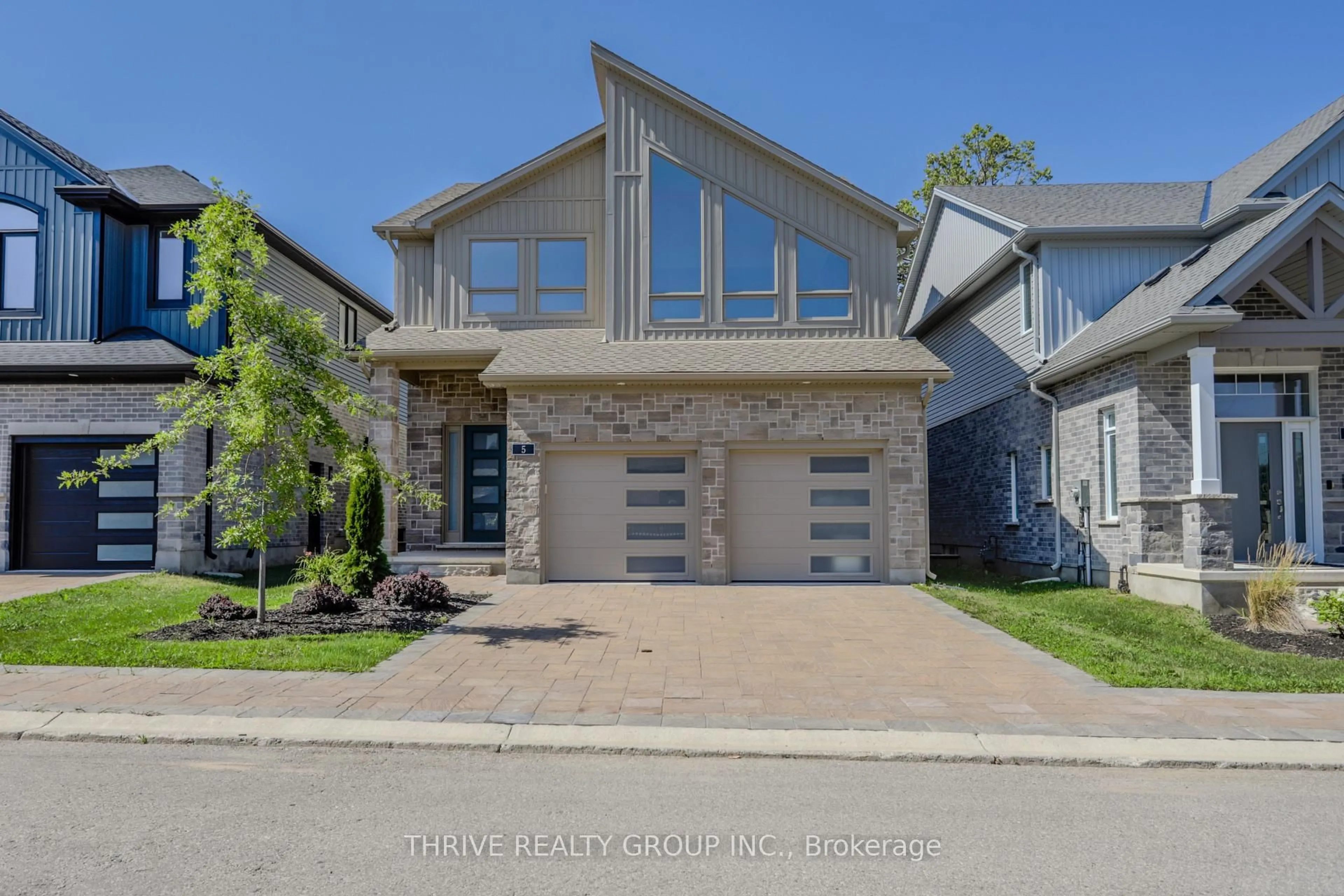 Home with brick exterior material, street for 1061 Eagletrace Dr #5, London North Ontario N6G 0T3