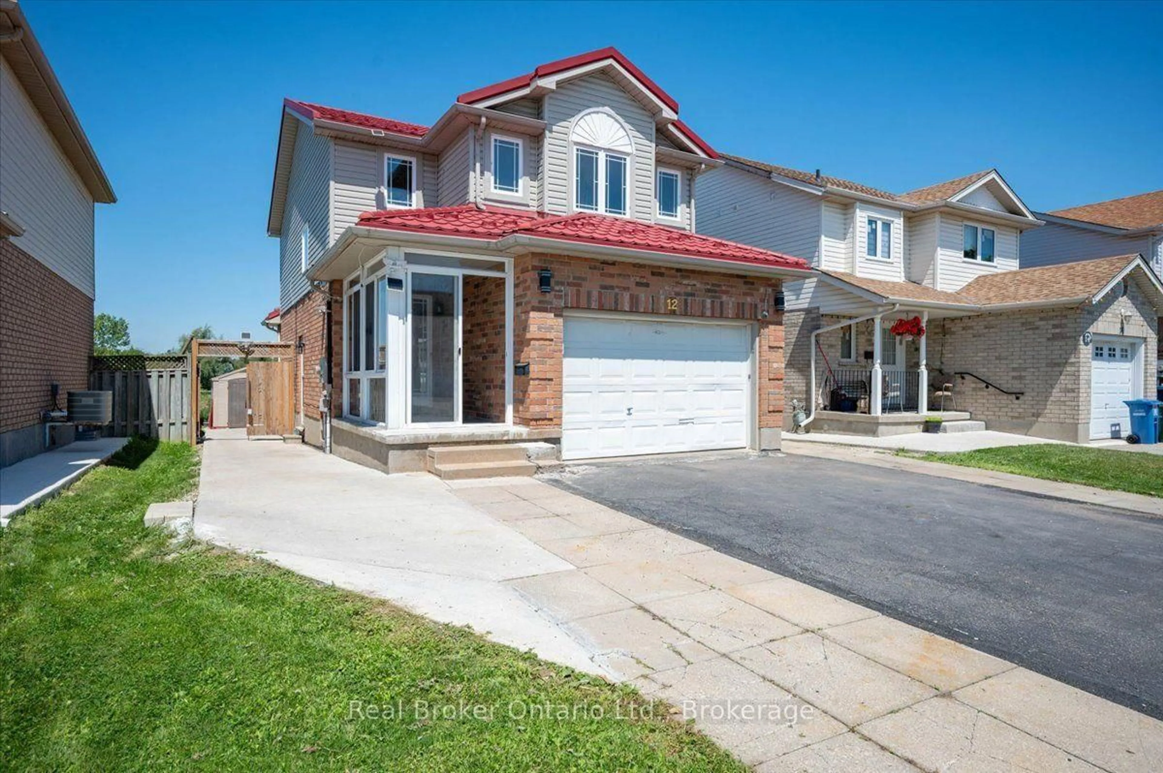 Home with brick exterior material, street for 12 Castlebury Dr, Guelph Ontario N1K 1X9