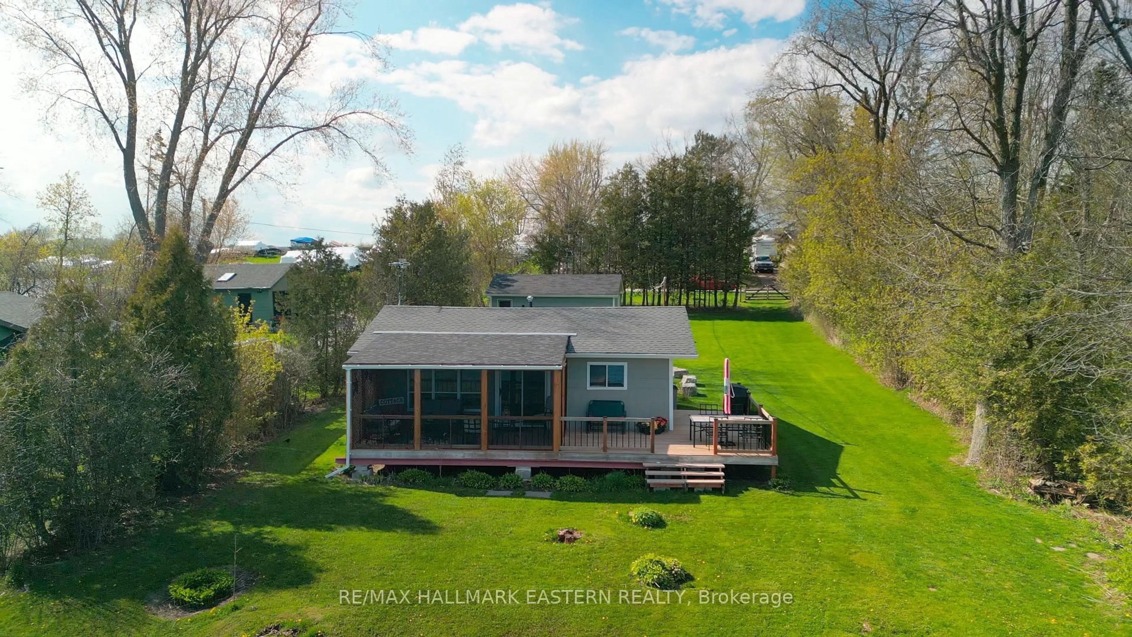A pic from outside/outdoor area/front of a property/back of a property/a pic from drone, water/lake/river/ocean view for 1095 Island View Dr, Otonabee-South Monaghan Ontario K0L 1B0