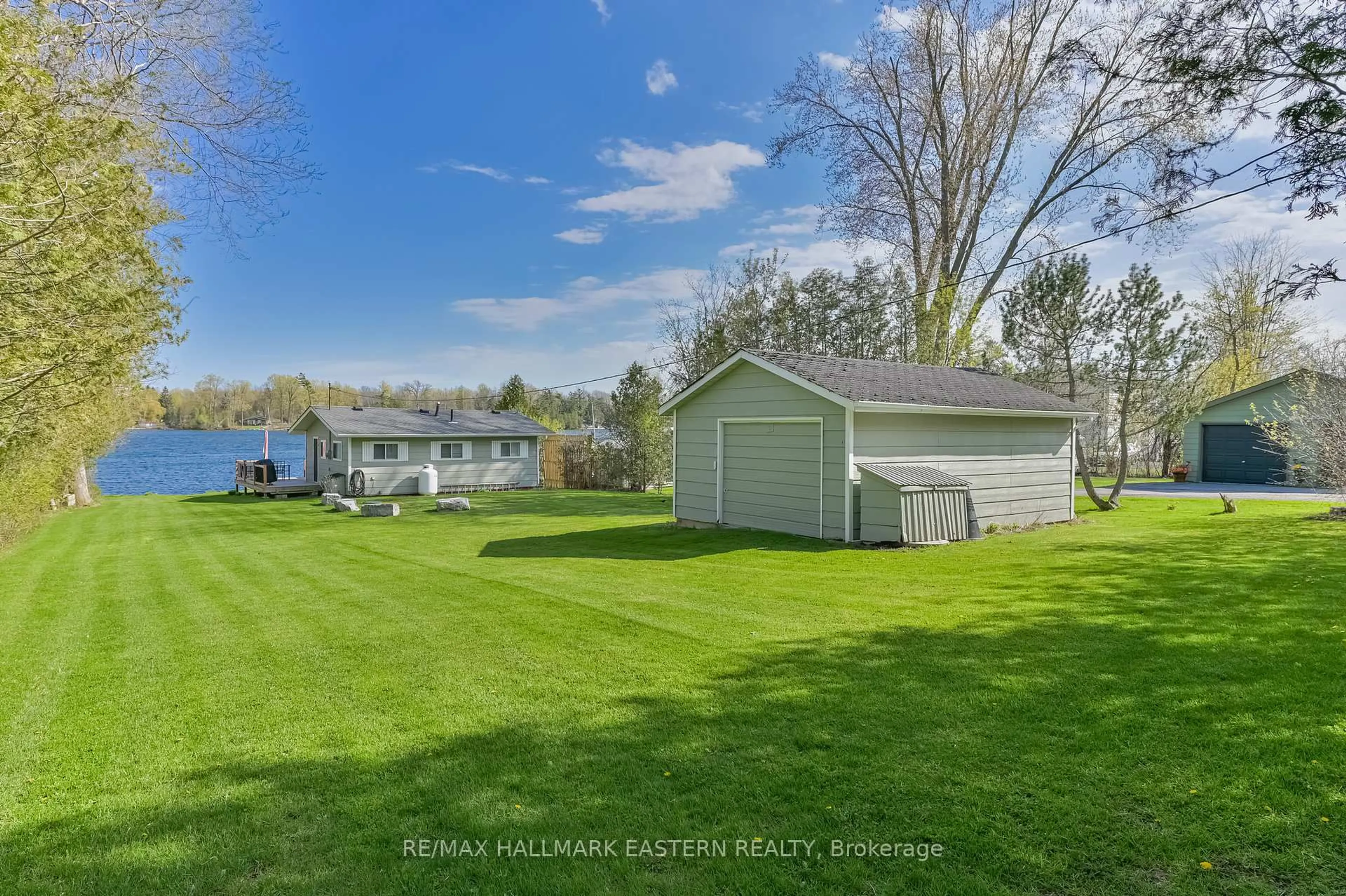 A pic from outside/outdoor area/front of a property/back of a property/a pic from drone, water/lake/river/ocean view for 1095 Island View Dr, Otonabee-South Monaghan Ontario K0L 1B0