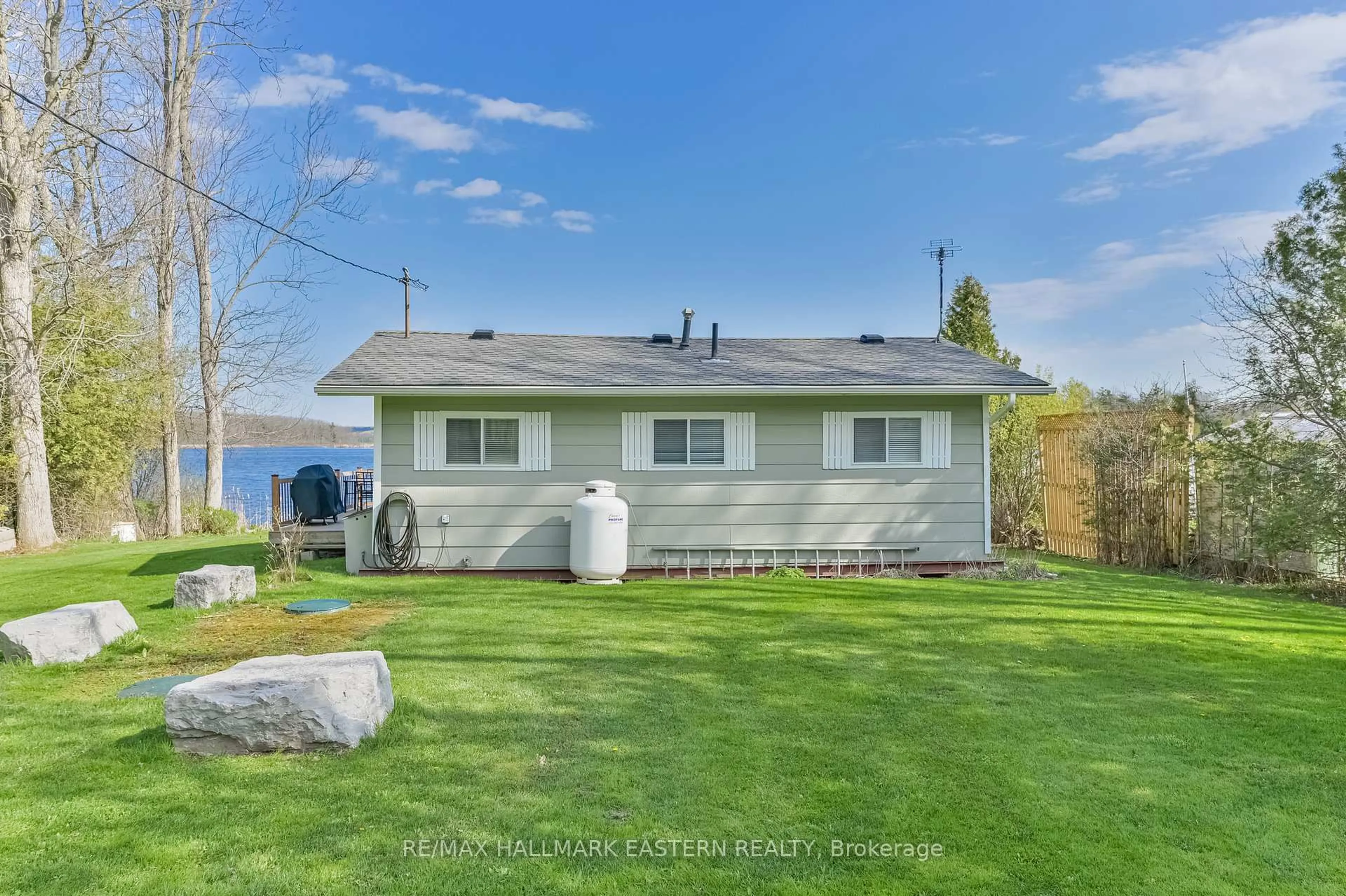 A pic from outside/outdoor area/front of a property/back of a property/a pic from drone, water/lake/river/ocean view for 1095 Island View Dr, Otonabee-South Monaghan Ontario K0L 1B0
