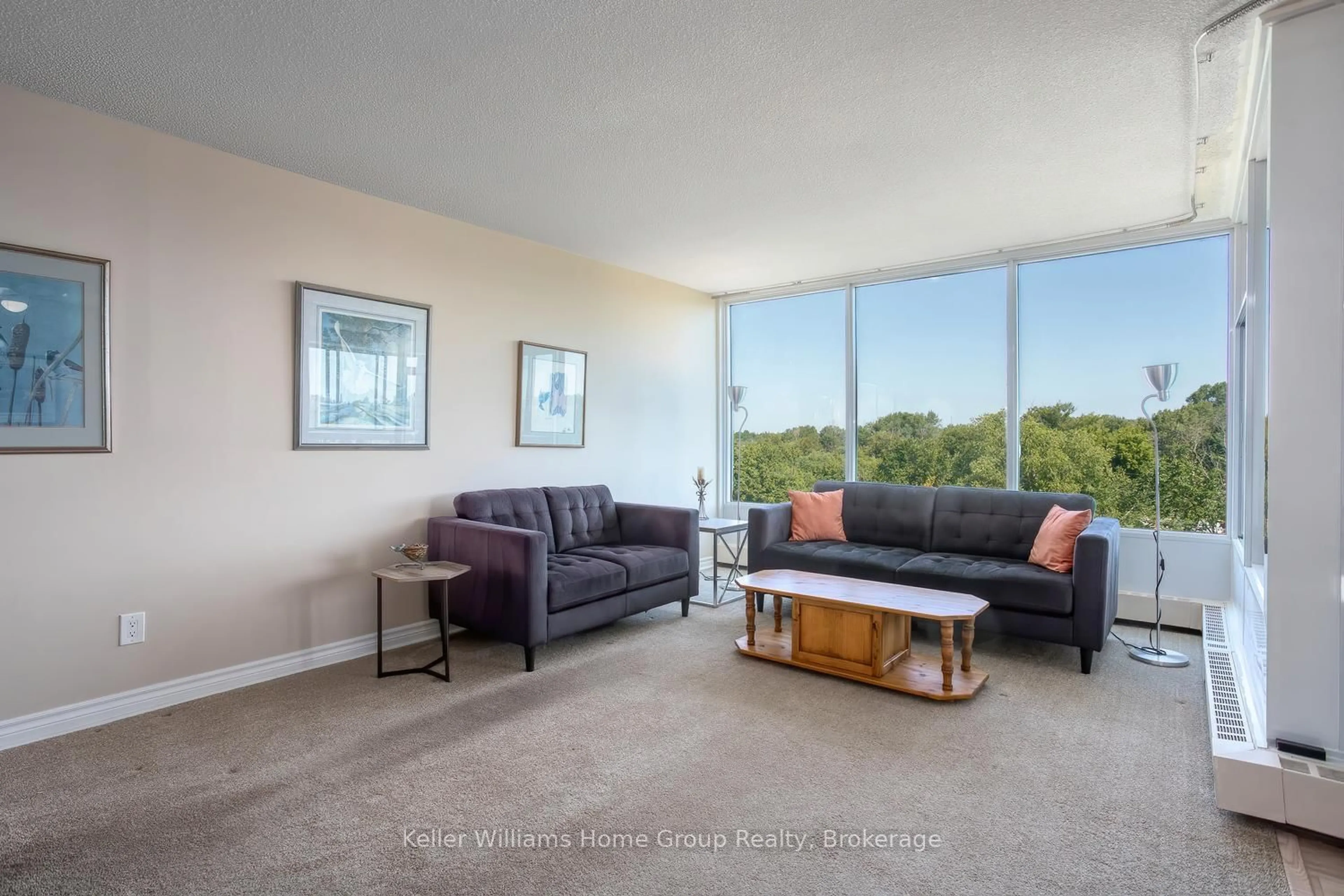 Living room with furniture, unknown for 23 Woodlawn Rd #505, Guelph Ontario N1H 7G6