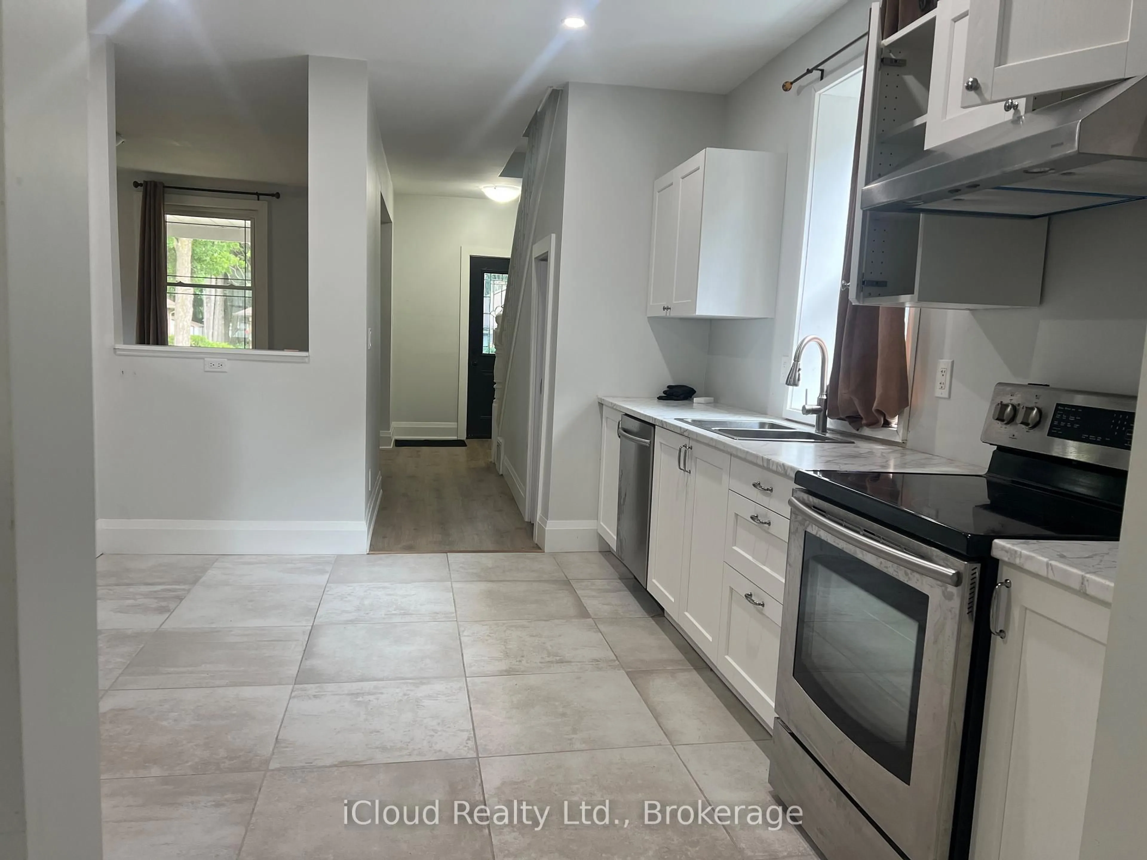 Open concept kitchen, ceramic/tile floor for 71 Osprey St, Southgate Ontario N0C 1B0