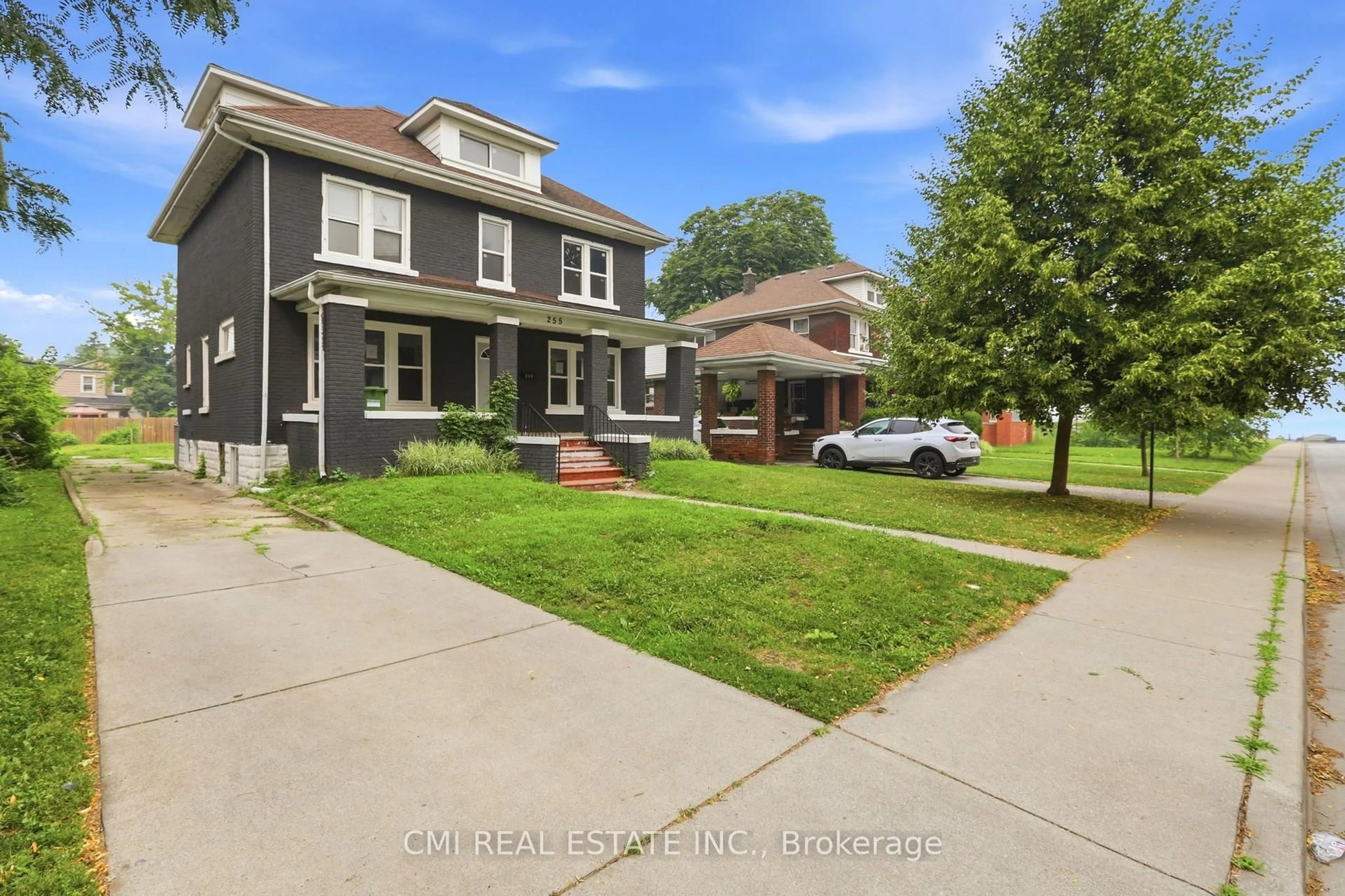 A pic from outside/outdoor area/front of a property/back of a property/a pic from drone, street for 255 Hall Ave, Windsor Ontario N9A 2L5