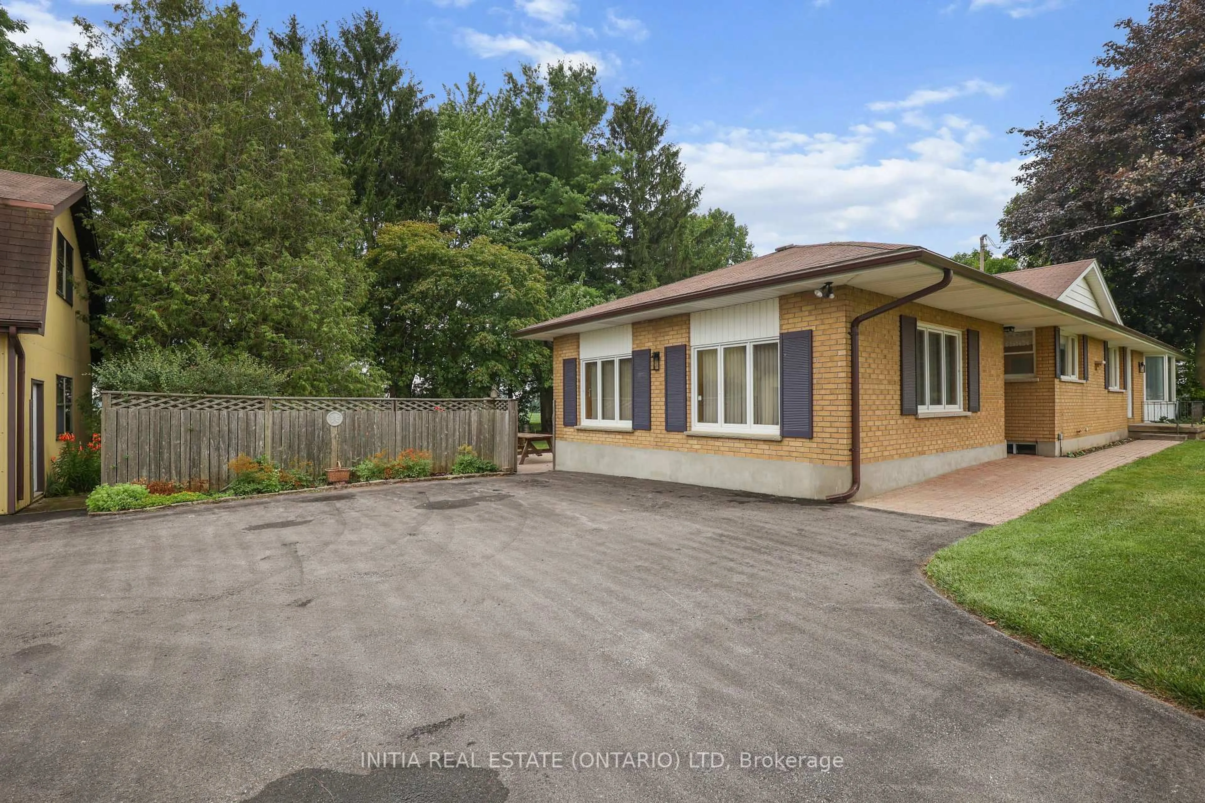 A pic from outside/outdoor area/front of a property/back of a property/a pic from drone, street for 10395 Longwoods Rd, Middlesex Centre Ontario N0L 1E0