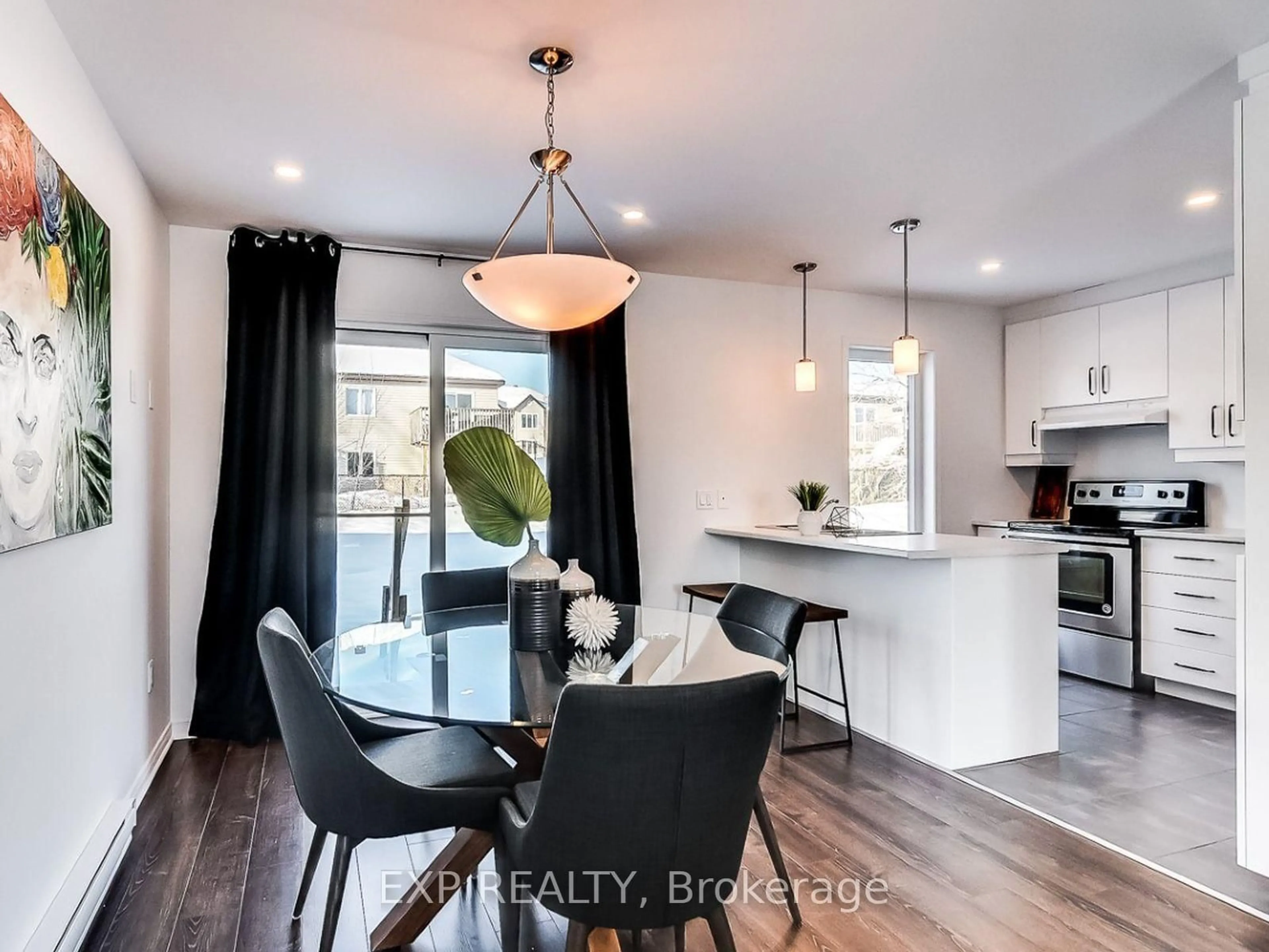 Open concept kitchen, wood/laminate floor for 255 Carpe St, Casselman Ontario K0A 1M0