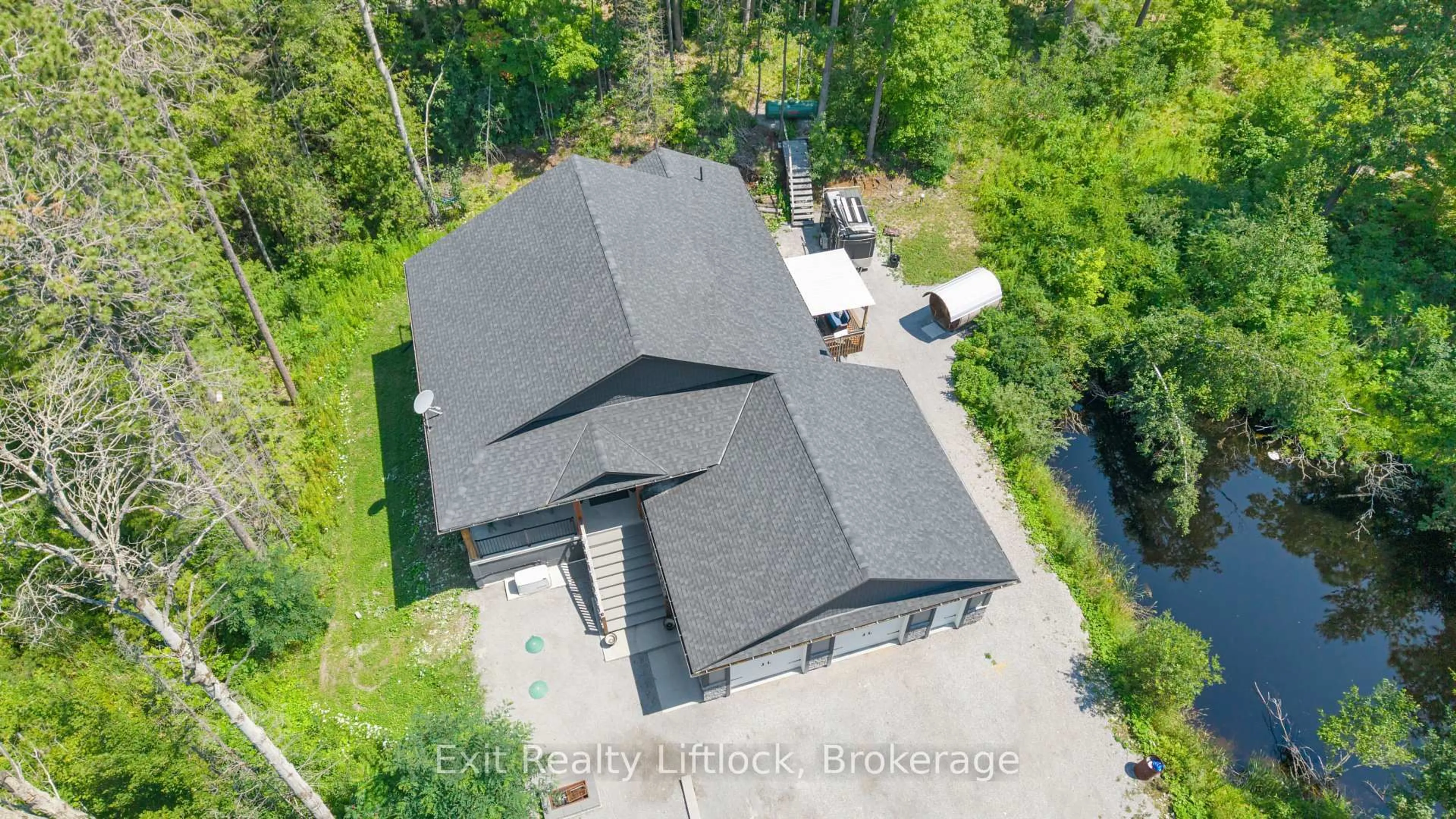 A pic from outside/outdoor area/front of a property/back of a property/a pic from drone, building for 4006 County Rd 36, Trent Lakes Ontario K0L 1J0