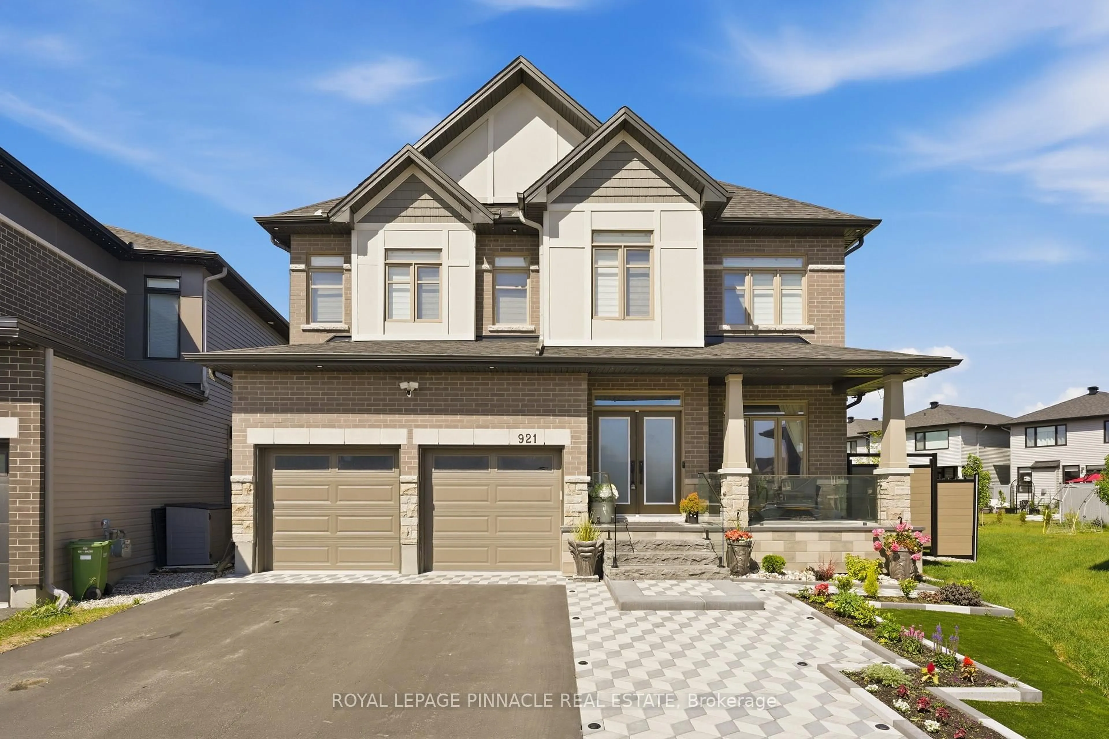 Home with brick exterior material, street for 921 Beckton Hts, Ottawa Ontario K2S 2X5
