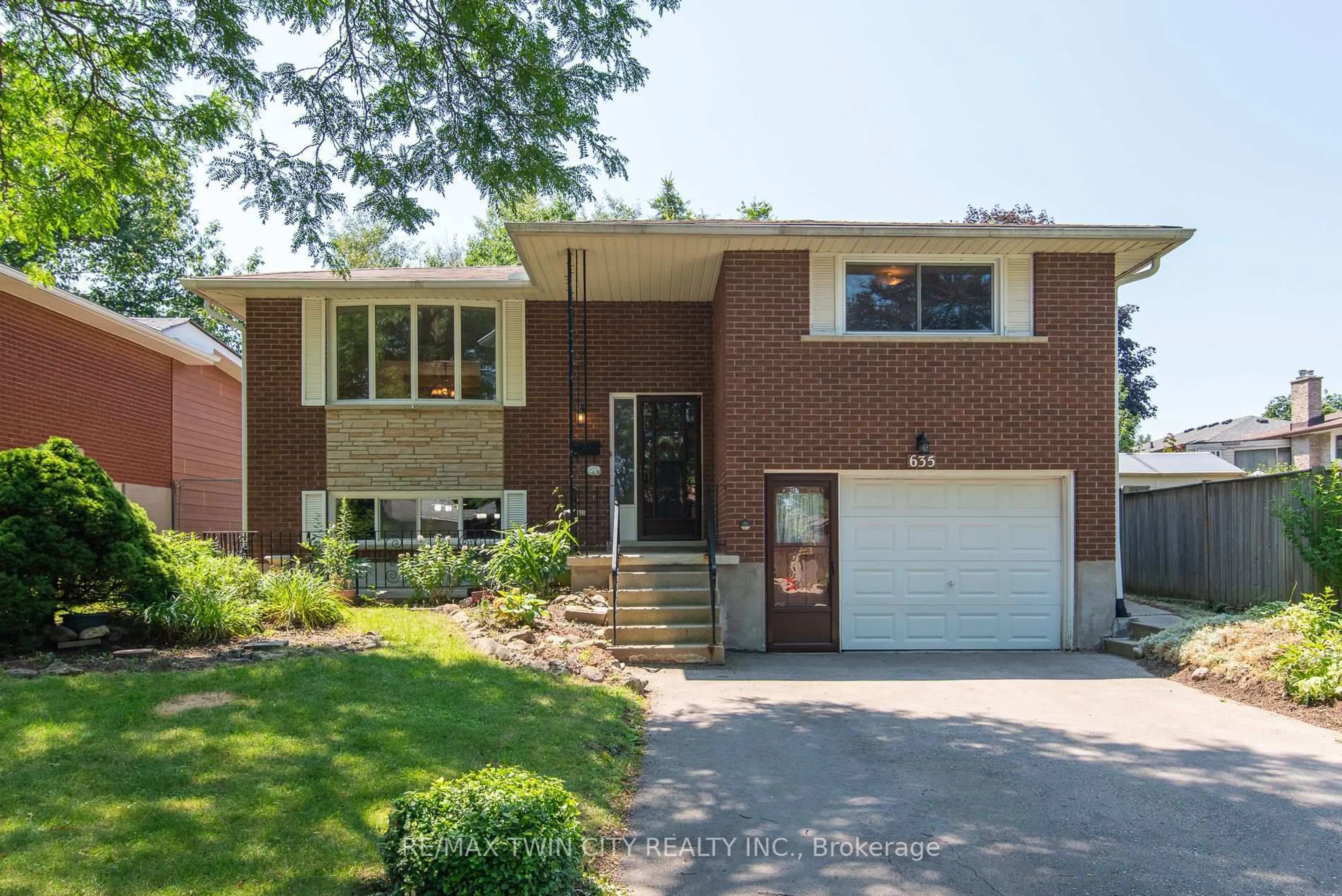 Home with brick exterior material, street for 635 Cedargrove Pl, Waterloo Ontario N2L 4Y8