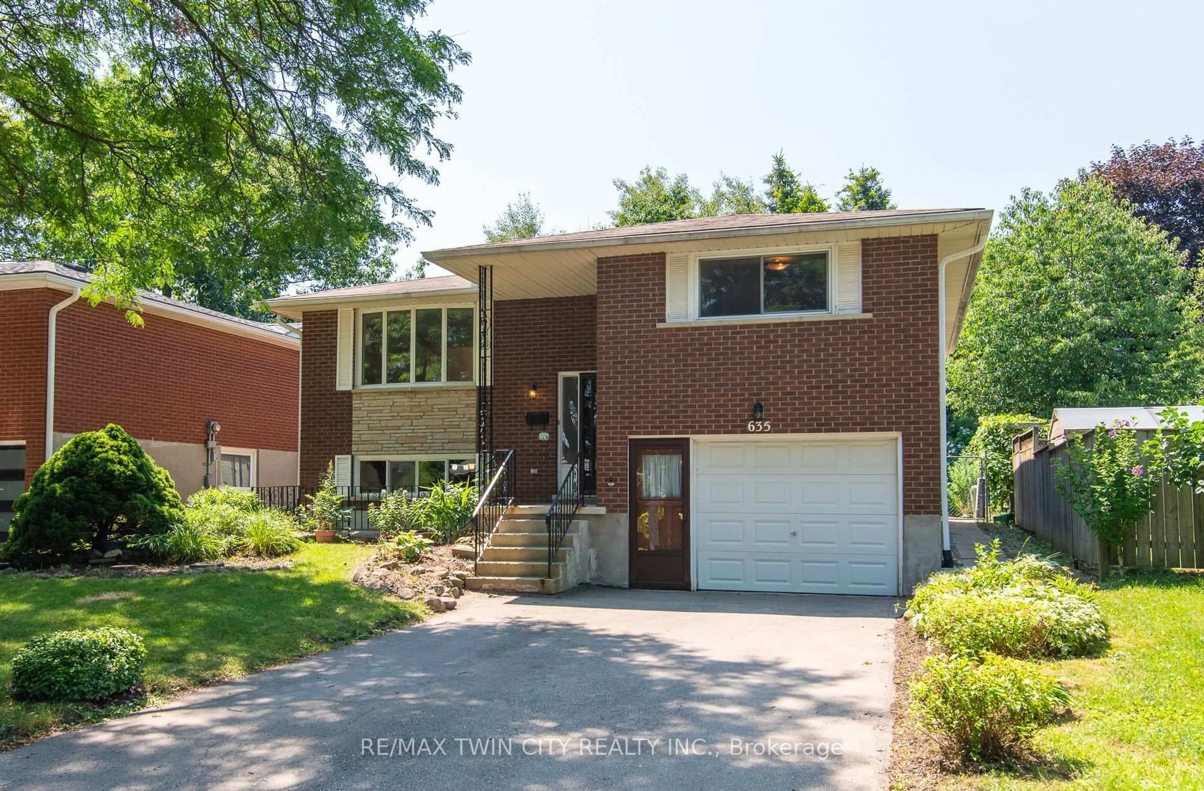 Home with brick exterior material, street for 635 Cedargrove Pl, Waterloo Ontario N2L 4Y8