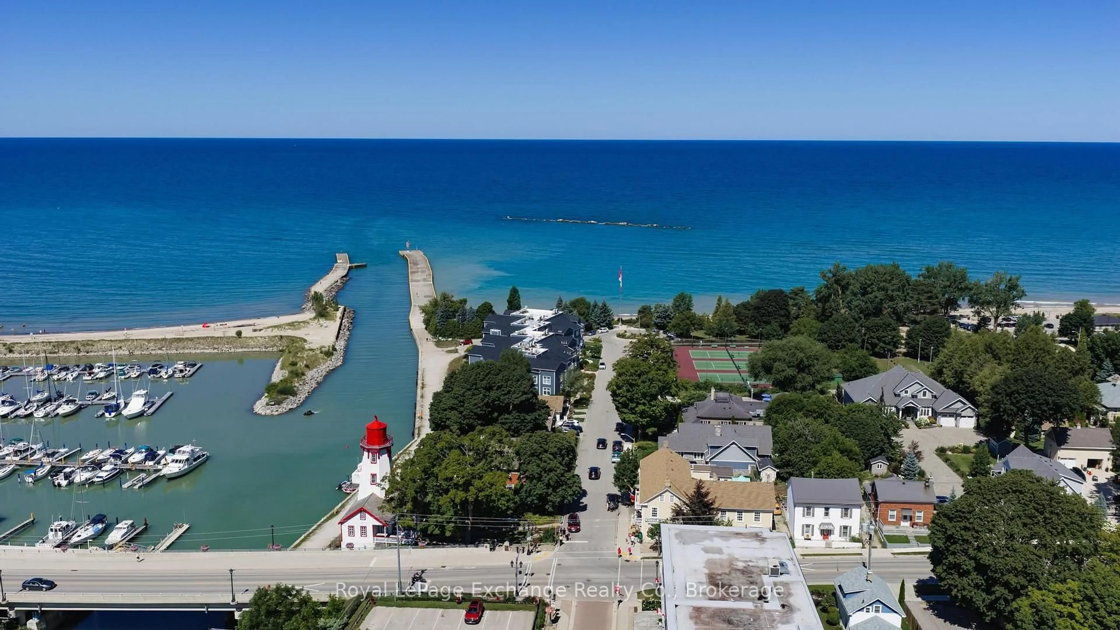 A pic from outside/outdoor area/front of a property/back of a property/a pic from drone, water/lake/river/ocean view for 200 Harbour St #204, Kincardine Ontario N2Z 3A3