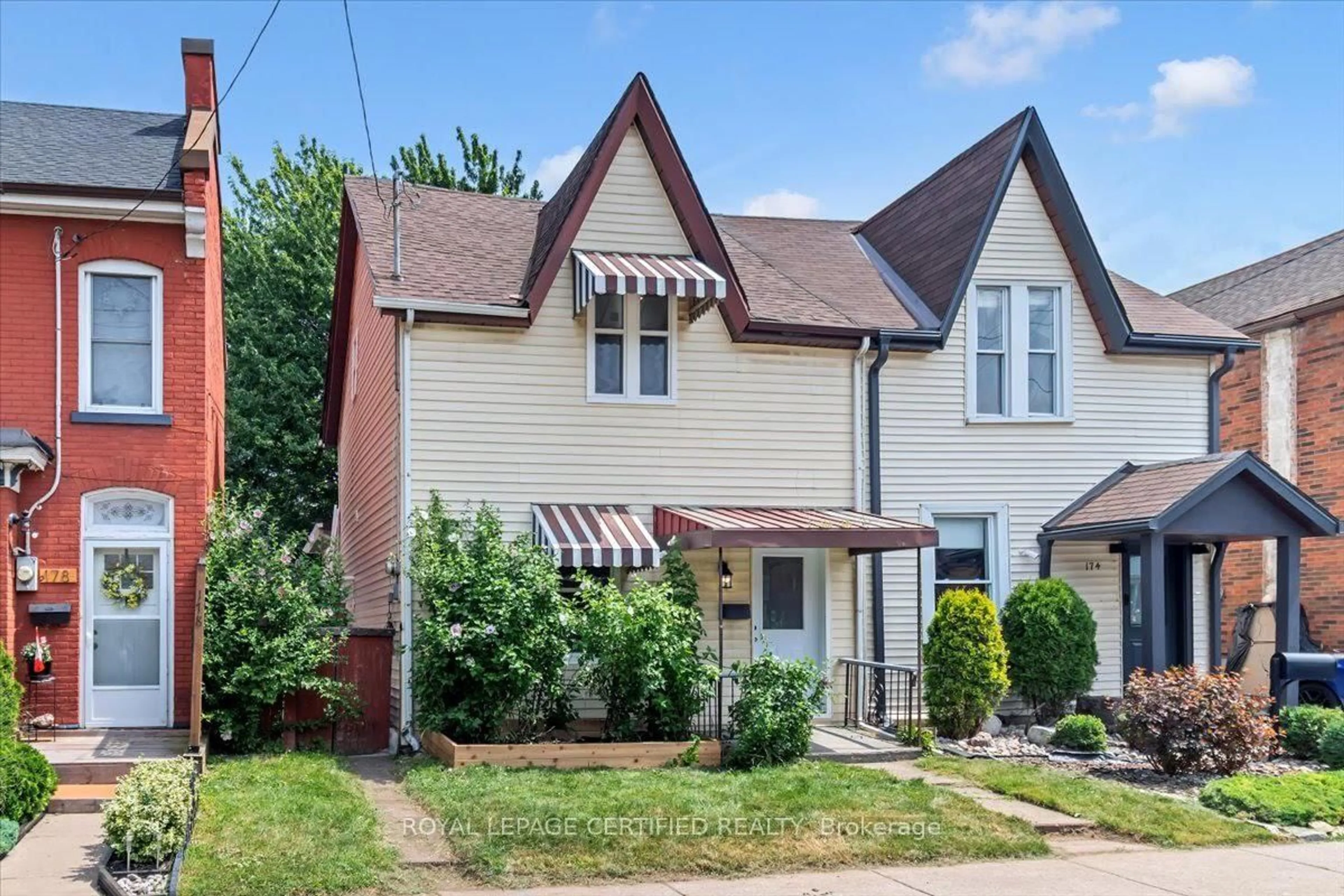 Home with brick exterior material, street for 176 Emerald St, Hamilton Ontario L8L 5K8