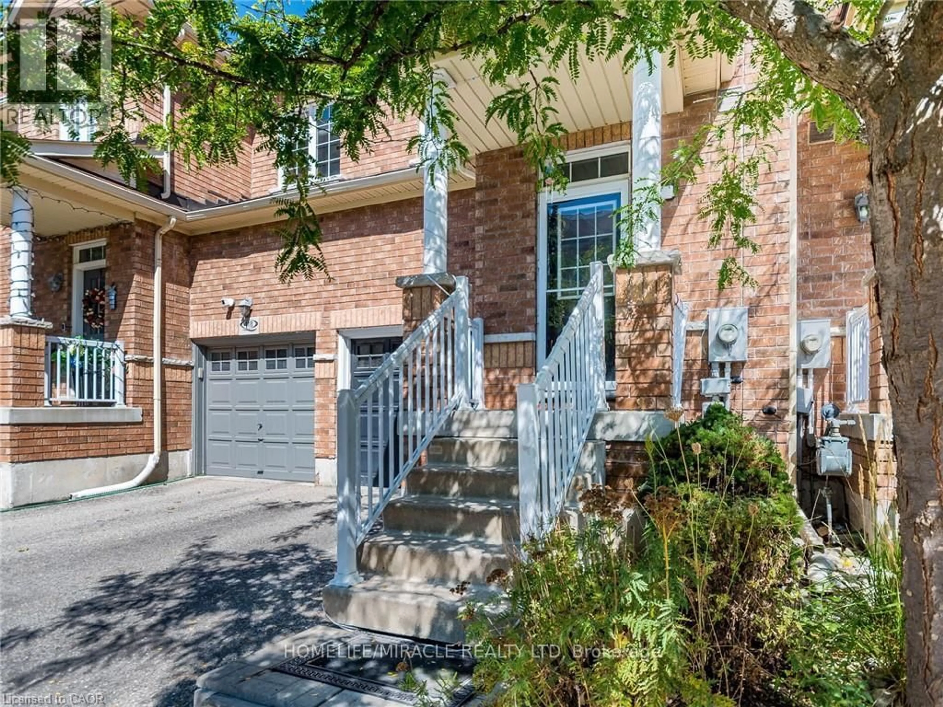 Home with brick exterior material, street for 110 Highland Rd #119, Kitchener Ontario N2M 3S1
