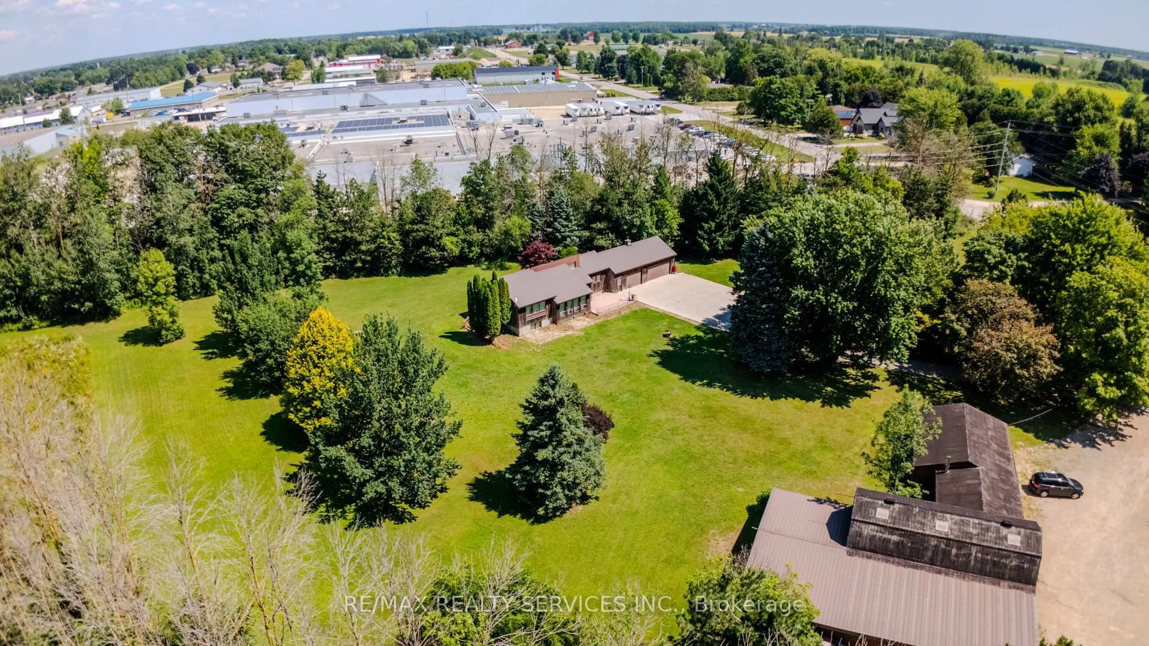 A pic from outside/outdoor area/front of a property/back of a property/a pic from drone, water/lake/river/ocean view for 1045 Tremaine Ave, North Perth Ontario N4W 3G9