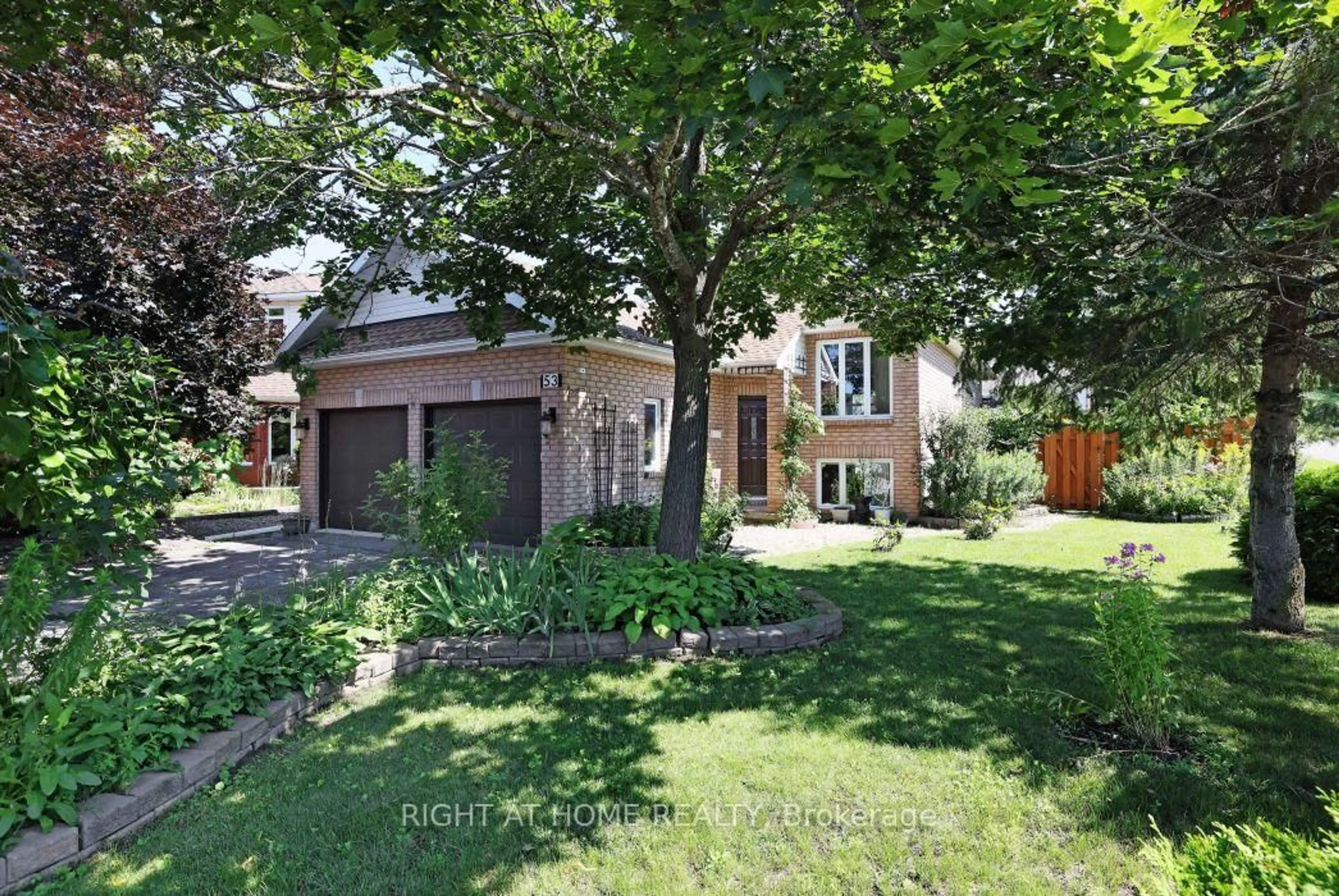 Home with brick exterior material, street for 53 Yoho Dr, Kanata Ontario K2M 2R4