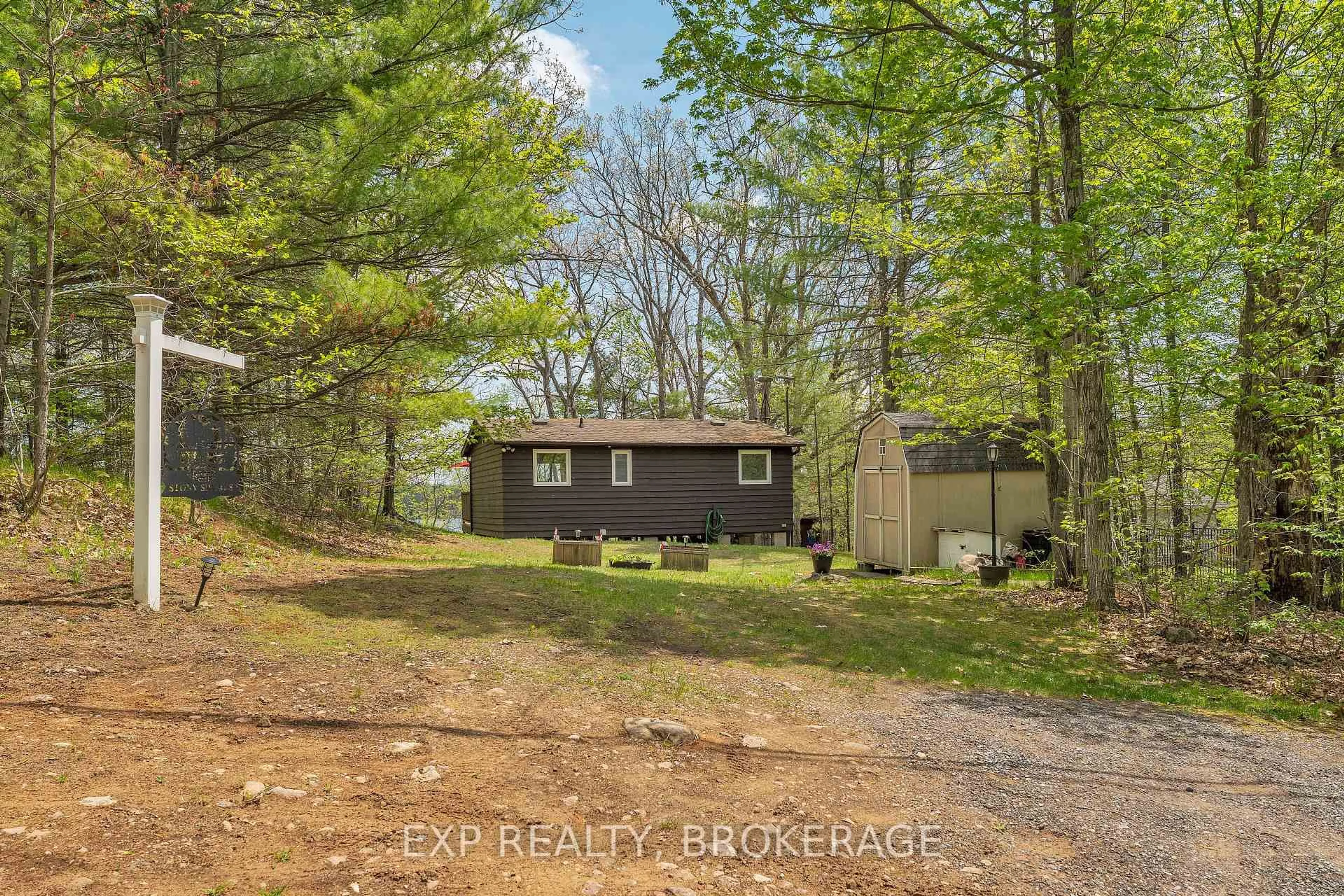 A pic from outside/outdoor area/front of a property/back of a property/a pic from drone, unknown for 3 Acorn Lane, Tichborne Ontario K0H 2V0