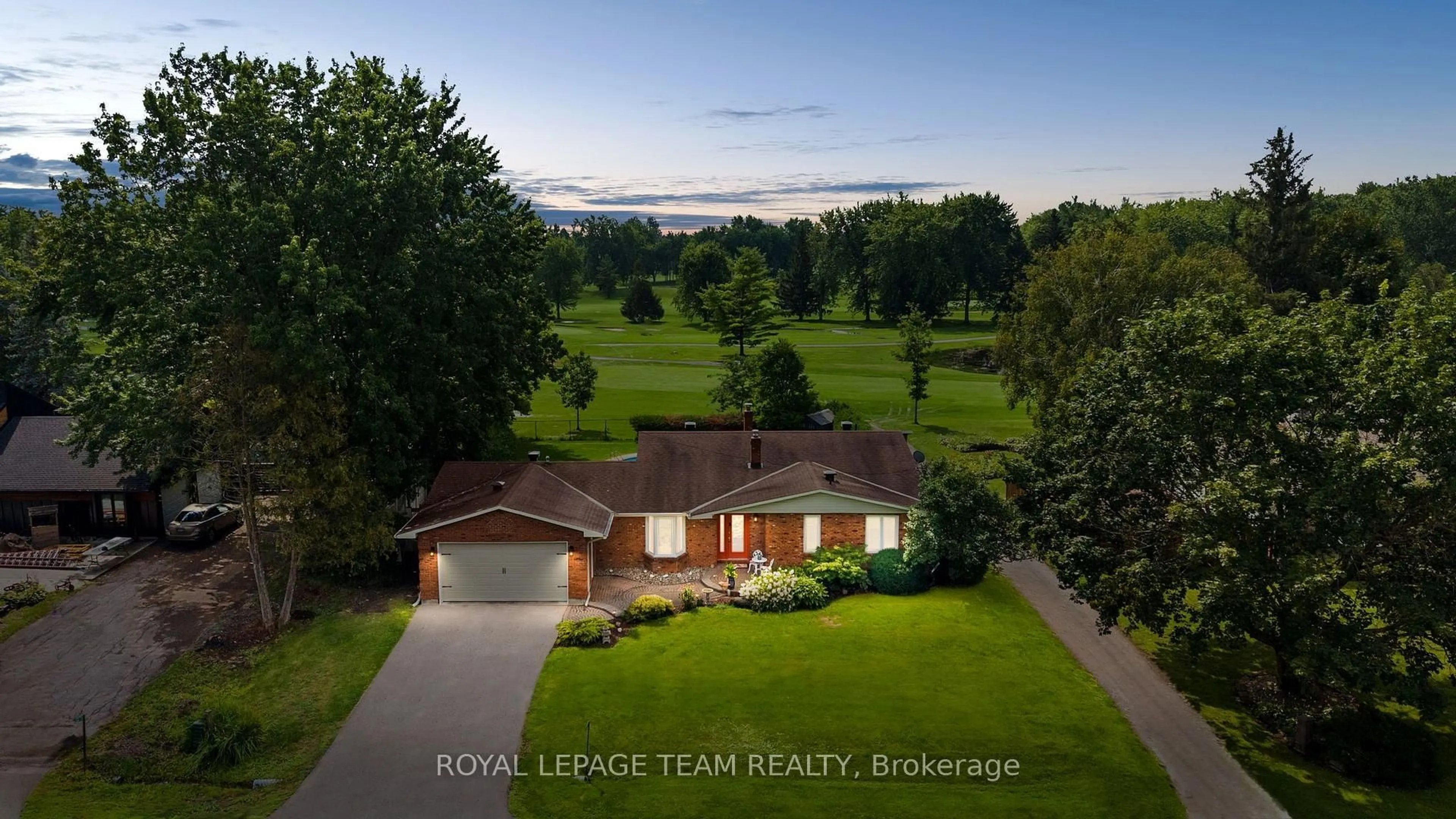 A pic from outside/outdoor area/front of a property/back of a property/a pic from drone, water/lake/river/ocean view for 1282 Fairway Dr, Manotick Ontario K4M 1B3